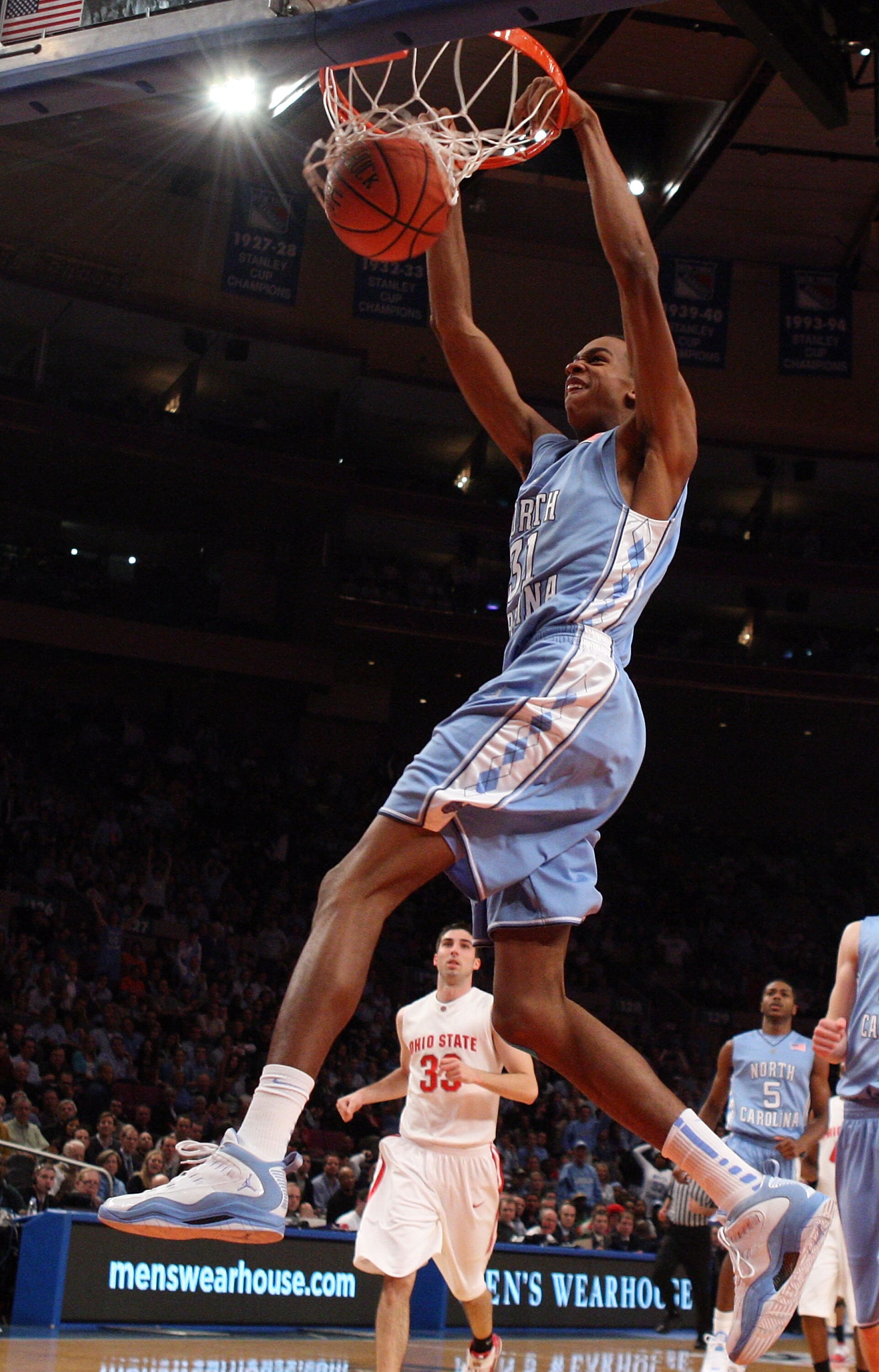 NEW YORK - NOVEMBER 19:  John Henson #31 of the North Carolina Tar Heels dunks against the Ohio State Buckeyes during their semifinal game of the 2K Sports Classic on  November 19, 2009 at Madison Square Garden in New York City.  (Photo by Jim McIsaac/Get