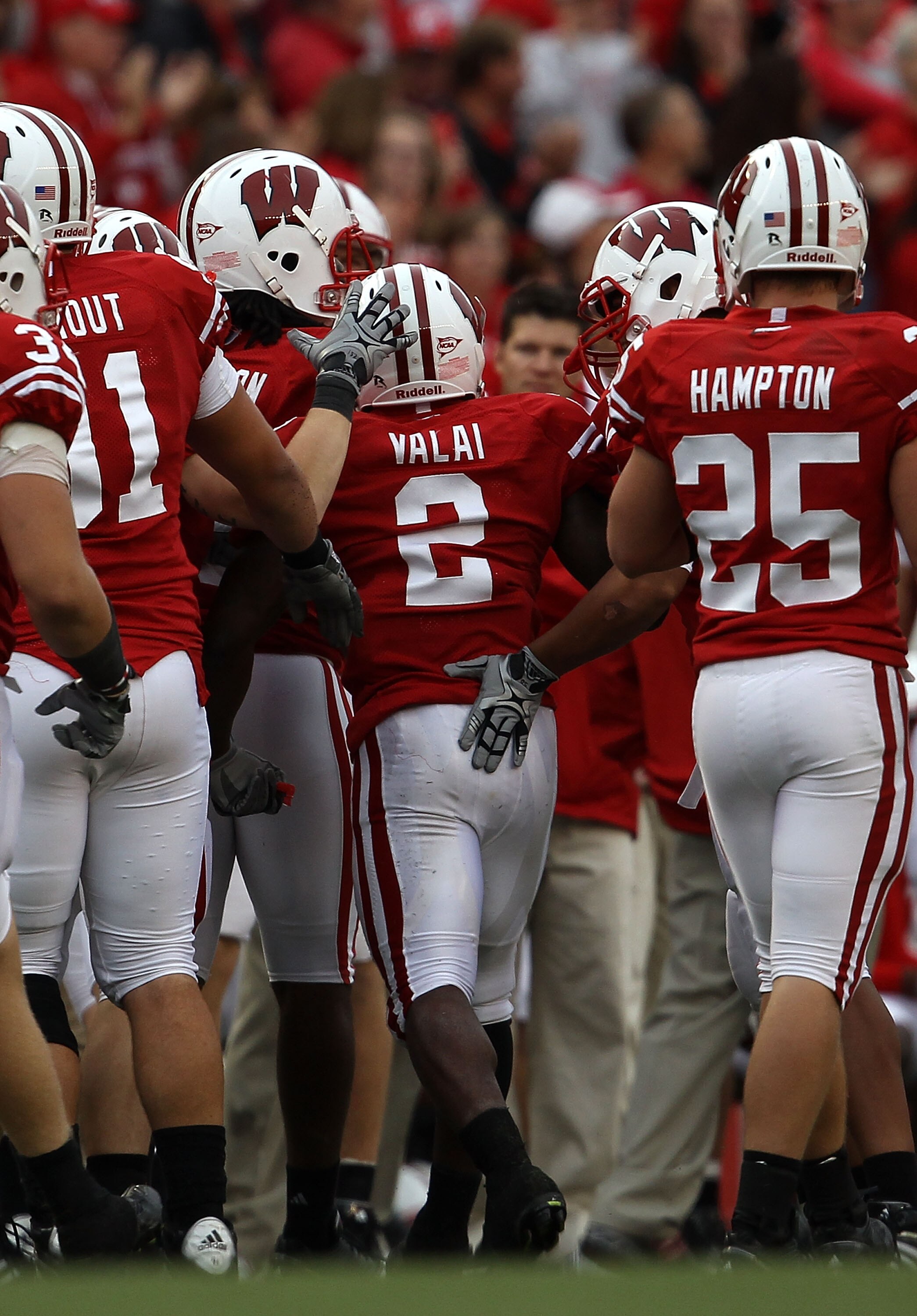 MADISON, WI - SEPTEMBER 18: Jay Valai #2 of the Wisconsin Badgers is congratulated by teammates after blocking an extra point attempt by the Arizona State Sun Devils at Camp Randall Stadium on September 18, 2010 in Madison, Wisconsin. Wisconsin defeated A