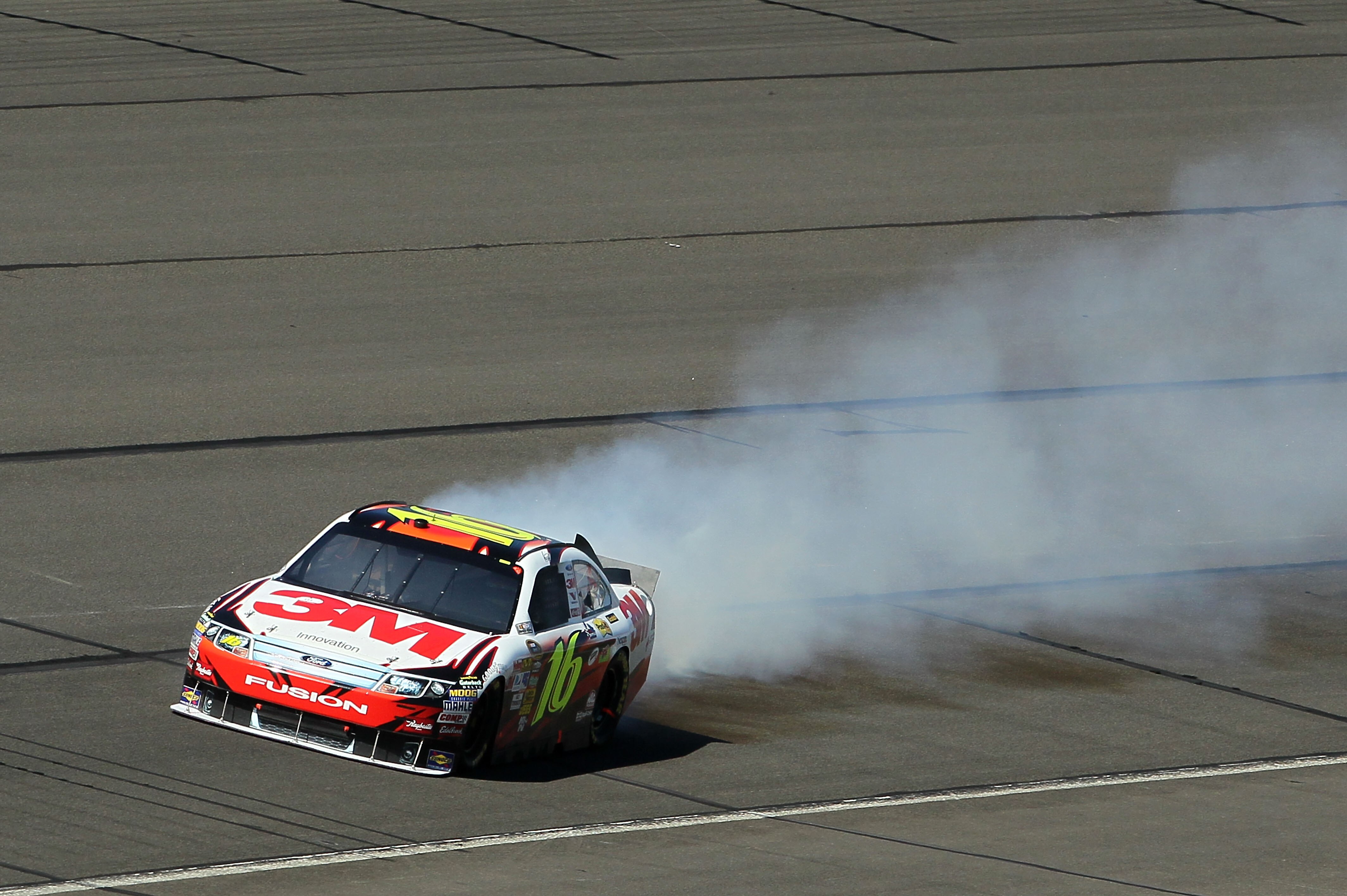 FONTANA, CA - OCTOBER 10:  Greg Biffle, driver of the #16 3M Ford, drives on the track after blowing his motor during the NASCAR Sprint Cup Series Pepsi Max 400 on October 10, 2010 in Fontana, California.  (Photo by Jeff Gross/Getty Images)