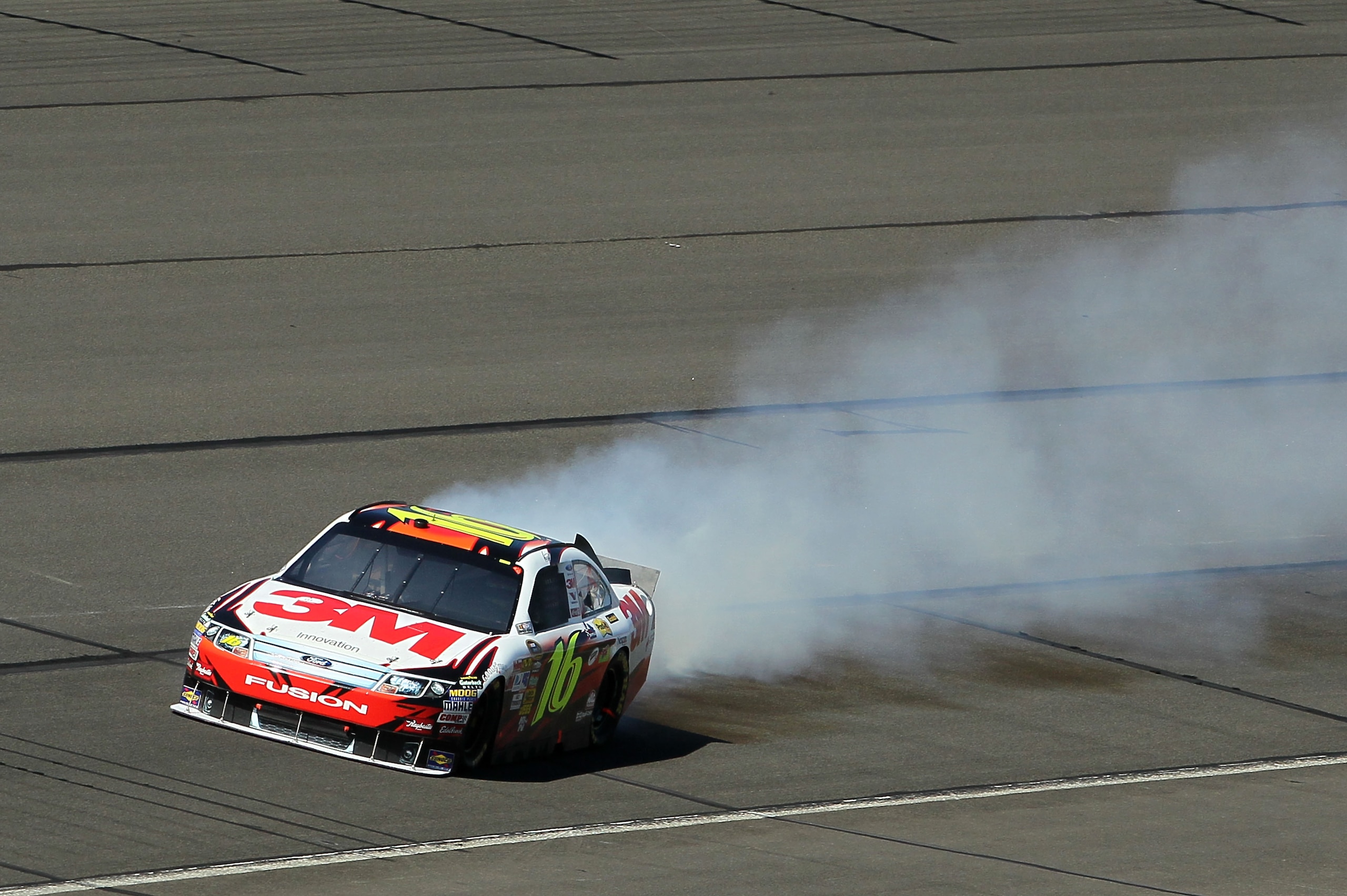 FONTANA, CA - OCTOBER 10:  Greg Biffle, driver of the #16 3M Ford, drives on the track after blowing his motor during the NASCAR Sprint Cup Series Pepsi Max 400 on October 10, 2010 in Fontana, California.  (Photo by Jeff Gross/Getty Images)