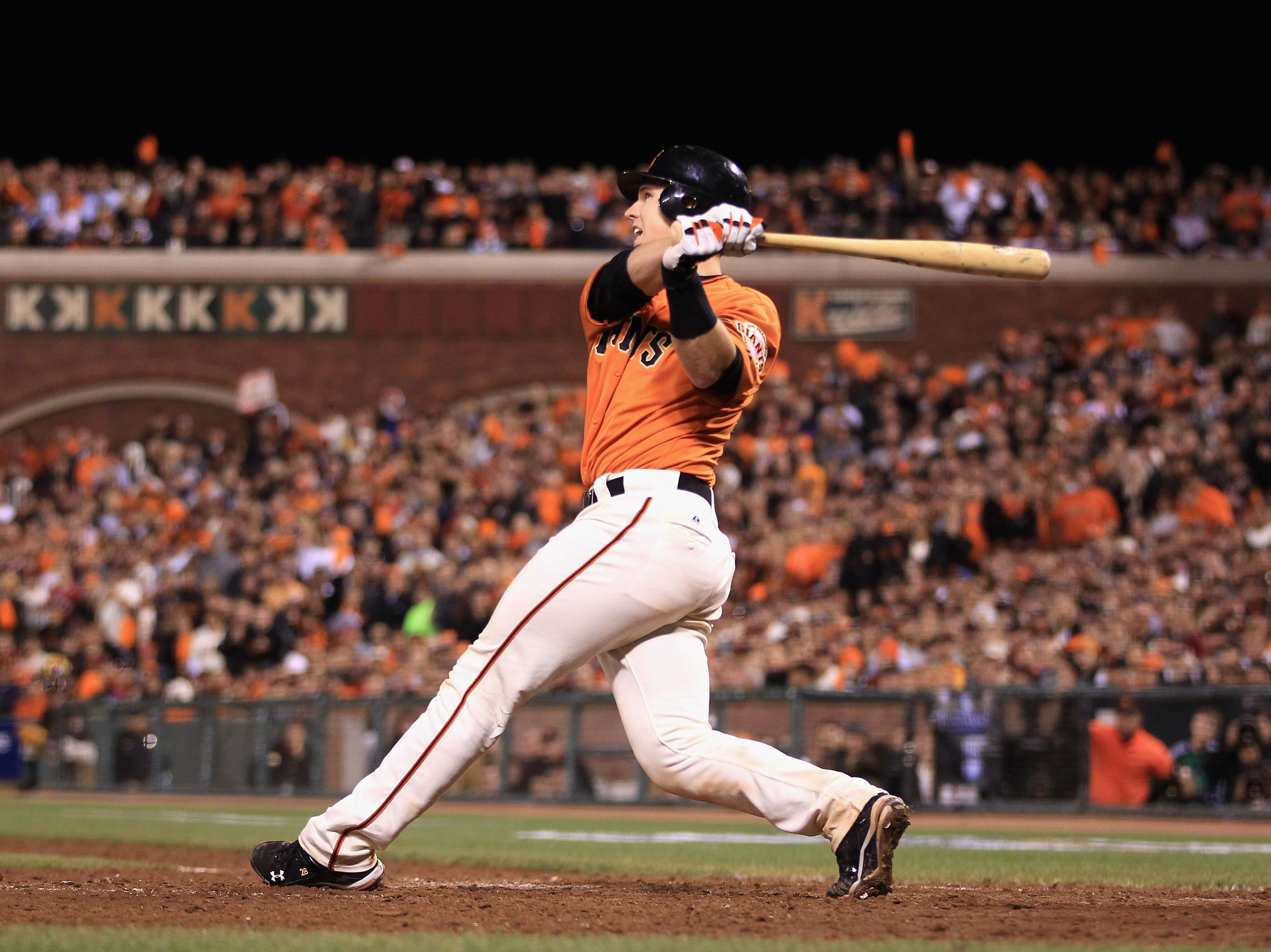 SAN FRANCISCO - OCTOBER 08:  Buster Posey #28 of the San Francisco Giants bats against the Atlanta Braves in game 2 of the NLDS at AT&T Park on October 8, 2010 in San Francisco, California.  (Photo by Ezra Shaw/Getty Images)