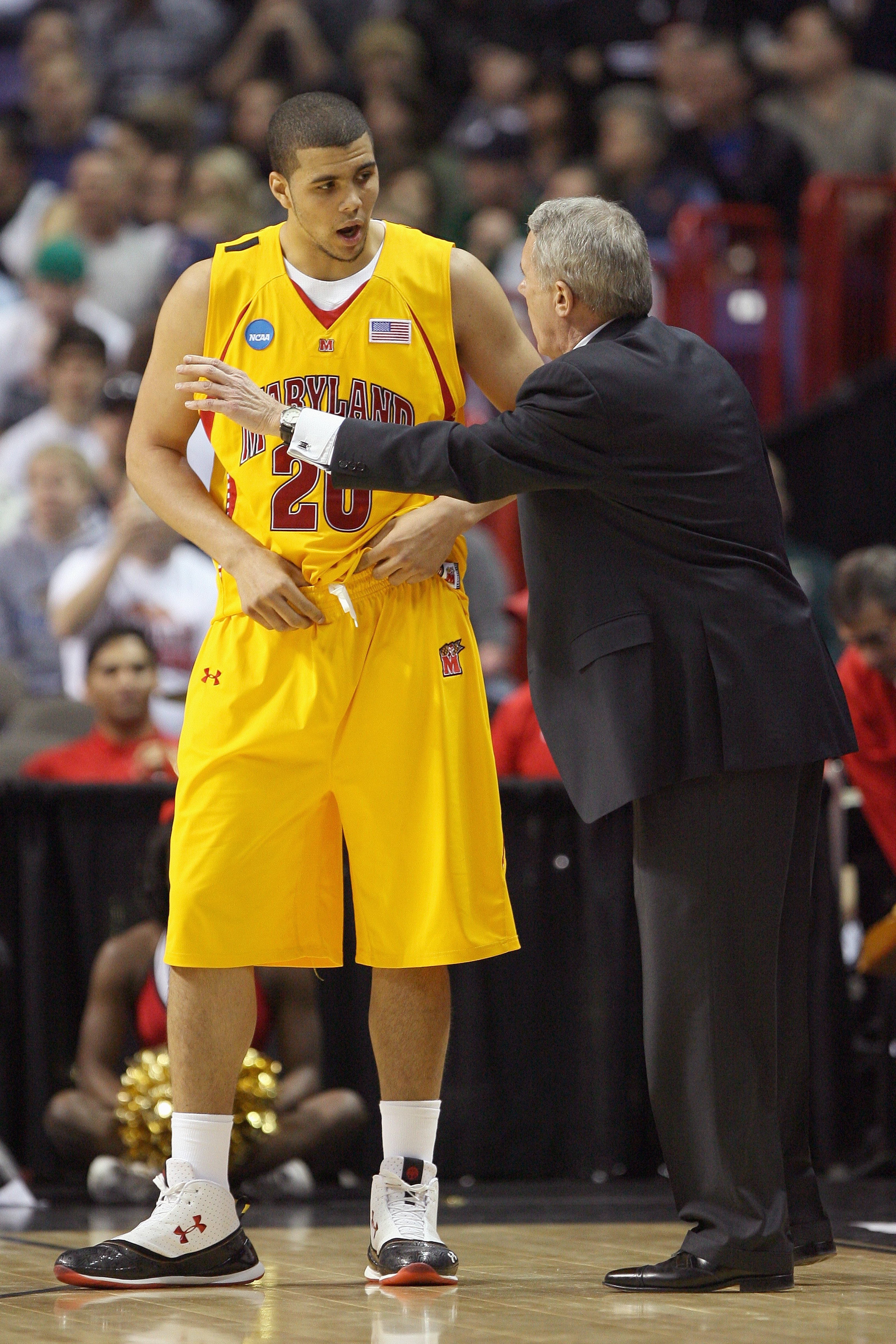 SPOKANE, WA - MARCH 21: Jordan Williams #20 of the Maryland Terrapins listens to head coach Gary Williams against the Michigan State Spartans during the second round of the 2010 NCAA men's basketball tournament at the Spokane Arena on March 21, 2010 in Sp