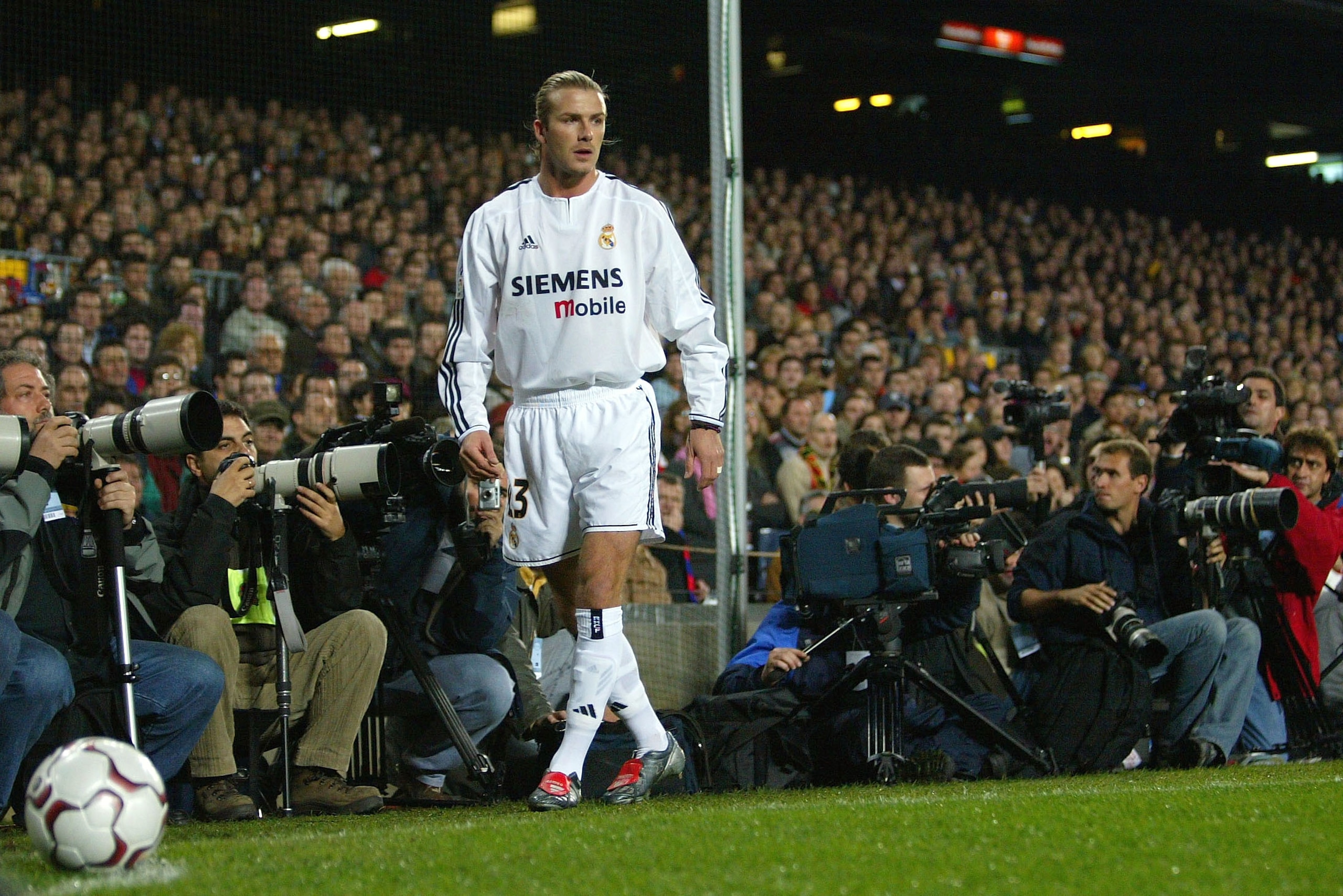 BARCELONA, SPAIN - DECEMBER 6:  David Beckham of Real Madrid closely watched by the media during the Spanish Primera Liga match between Barcelona and Real Madrid at the Nou Camp Stadium on December 6, 2003 in Barcelona, Spain.  (Photo by Shaun Botterill/G