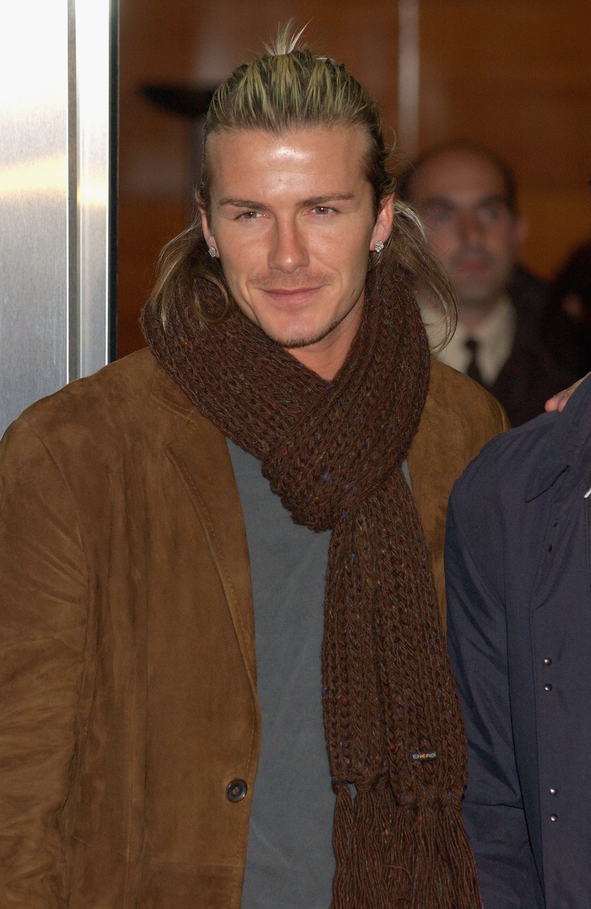 MADRID, SPAIN - DECEMBER 11:  Football player David Beckham of England and Real Madrid visits hospital La Zarzuela to give some presents to children at La Zarzuela Hospital December 11, 2003 in Madrid, Spain.  (Photo by Carlos Alvarez/Getty Images)