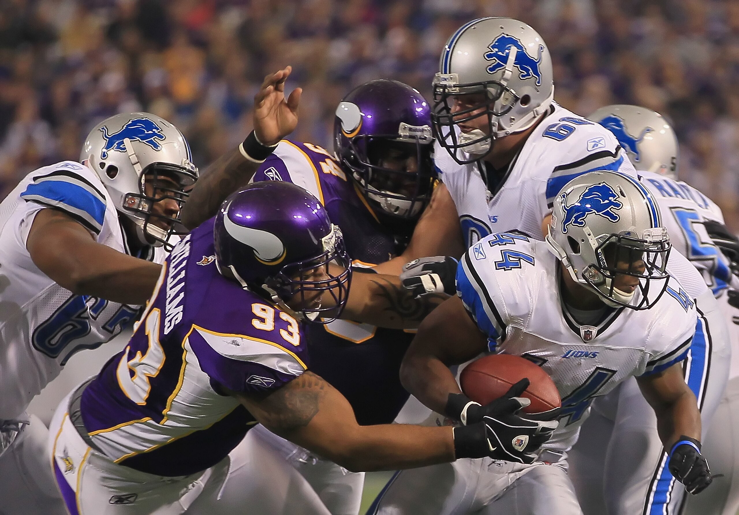 MINNEAPOLIS - SEPTEMBER 26:  Running back Jahvid Best #44 of the Detroit Lions is pursued by Kevin Williams #93 of the Minnesota Vikings during the first half at Hubert H. Humphrey Metrodome on September 26, 2010 in Minneapolis, Minnesota. The Vikings def