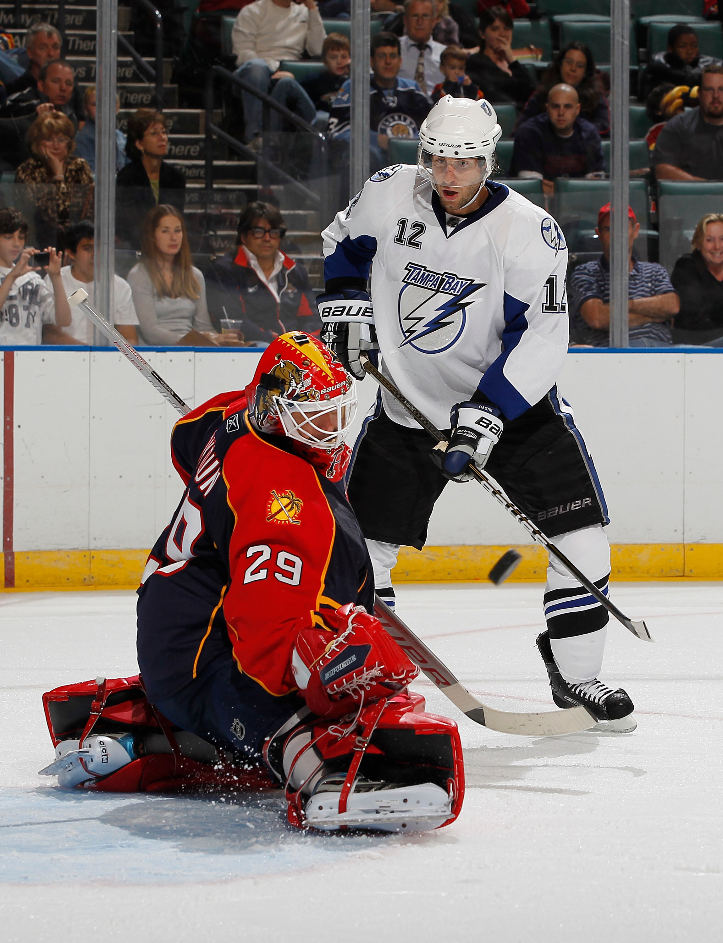 SUNRISE, FL - OCTOBER 1: Goaltender Tomas Vokoun #29 of the Florida Panthers stops a shot from Simon Gagne #12 of the Tampa Bay Lightning during a preseason game on October 1, 2010 at the BankAtlantic Center in Sunrise, Florida. (Photo by Joel Auerbach/Ge