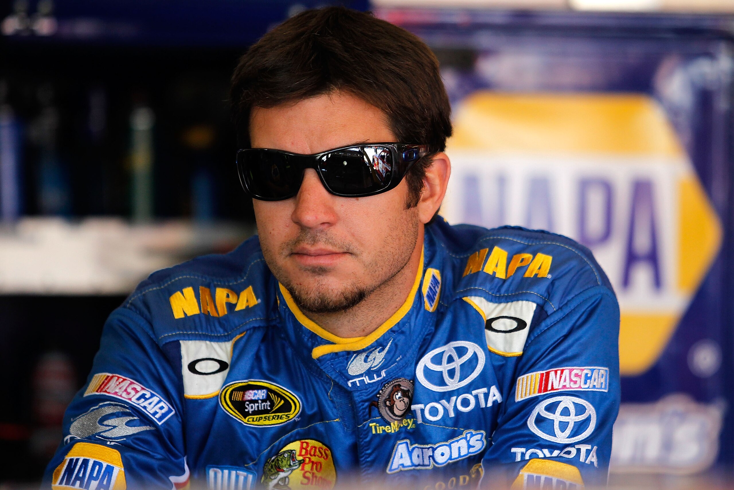 FONTANA, CA - OCTOBER 09:  Martin Truex Jr., driver of the #56 NAPA Toyota, stands in the garage during practice for the NASCAR Sprint Cup Series Pepsi Max 400 on October 9, 2010 in Fontana, California.  (Photo by Todd Warshaw/Getty Images for NASCAR)
