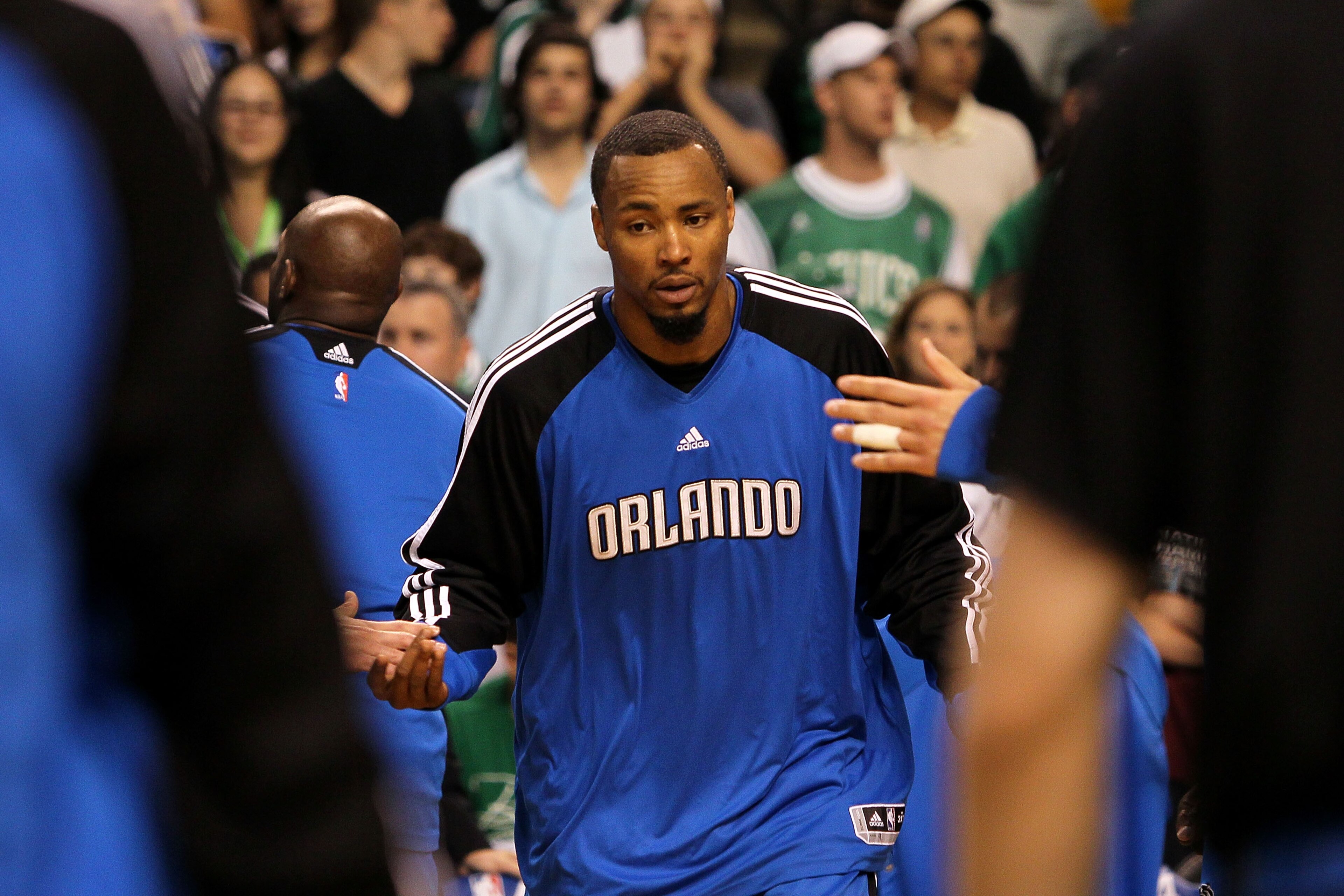 BOSTON - MAY 22:  Rashard Lewis #9 of the Orlando Magic greets his teammates during player introducitons against the Boston Celtics at TD Banknorth Garden in Game Three of the Eastern Conference Finals during the 2010 NBA Playoffs on May 22, 2010 in Bosto