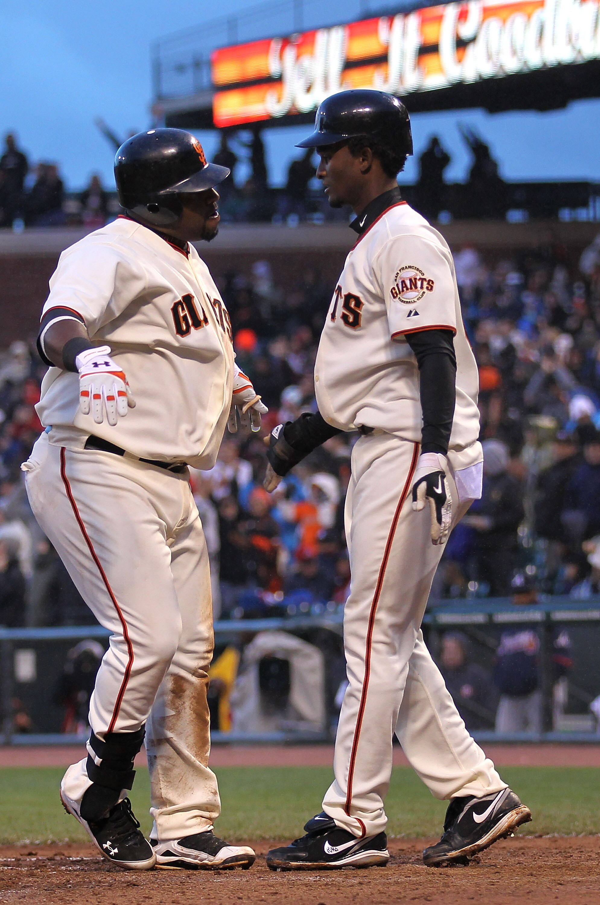 SAN FRANCISCO - APRIL 11:  Pablo Sandoval #48 of the San Francisco Giants celebrates with Eugenio Velez #8 after hitting a two run home run in the 8th innning against the Atlanta Braves during an MLB game at AT&T Park on April 11, 2010 in San Francisco, C