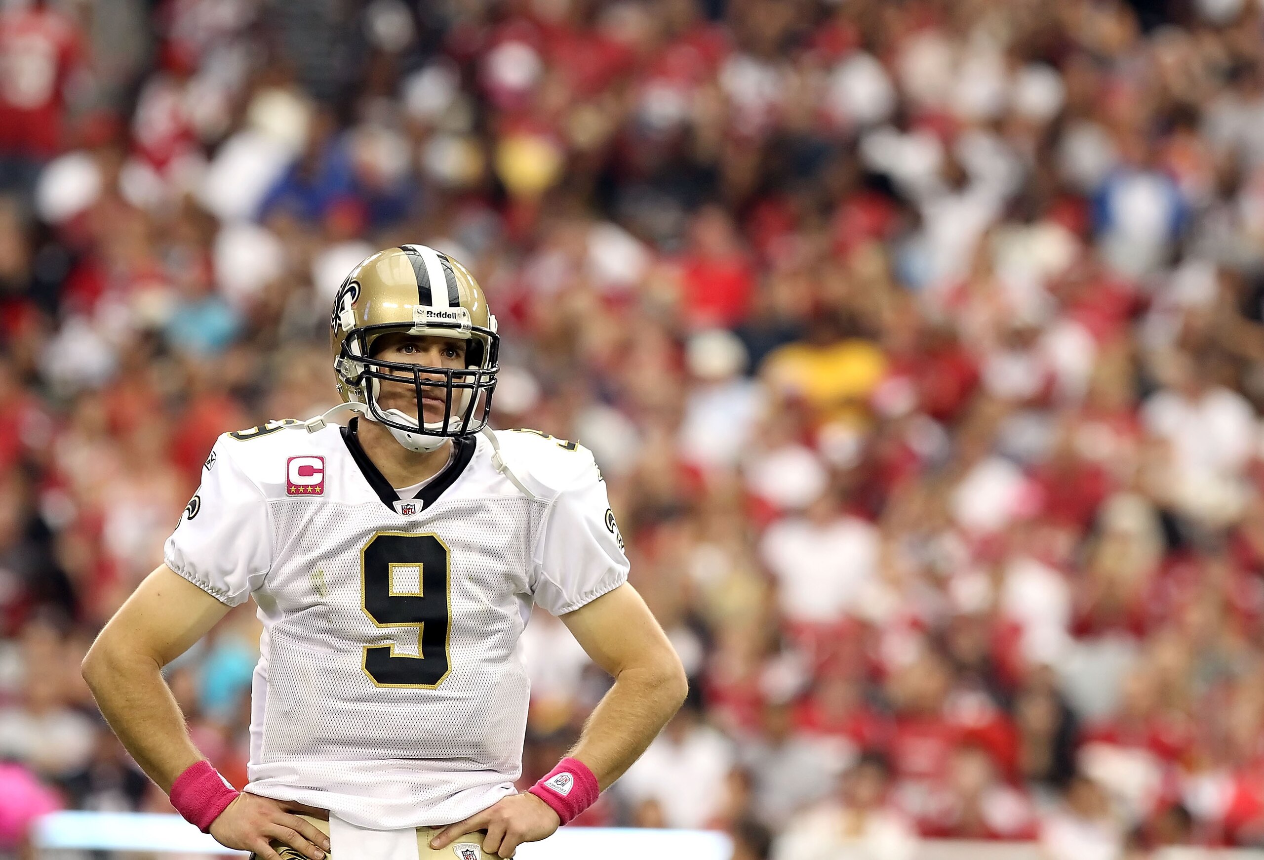 GLENDALE, AZ - OCTOBER 10:  Quarterback Drew Brees #9 of the New Orleans Saints looks over to the bench during the NFL game against the Arizona Cardinals at the University of Phoenix Stadium on October 10, 2010 in Glendale, Arizona. The Cardinals defeated