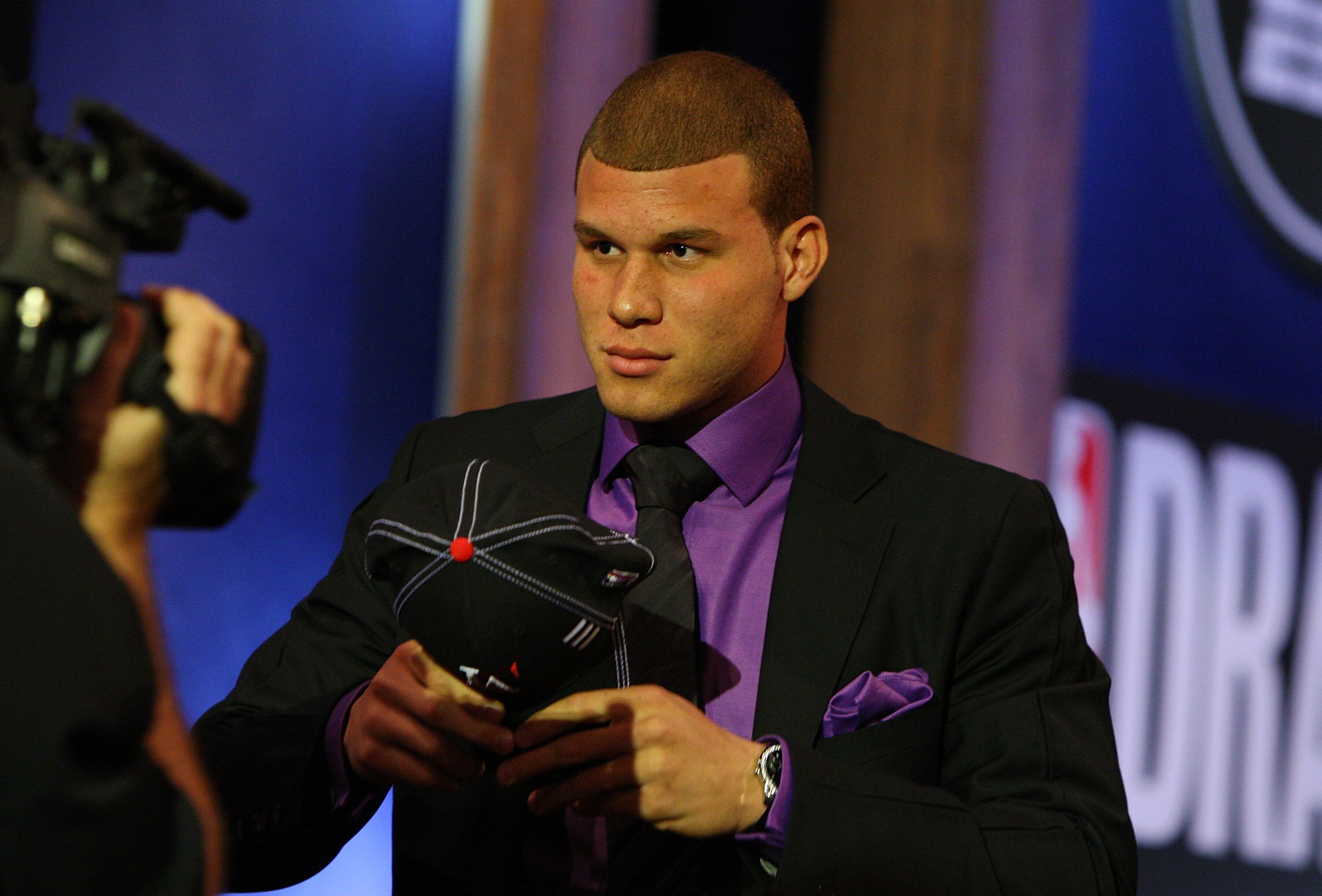 NEW YORK - JUNE 25:  First overall draft pick by the Los Angeles Clippers,  Blake Griffin is congratulated by members of his entourage during the 2009 NBA Draft at the Wamu Theatre at Madison Square Garden June 25, 2009 in New York City. NOTE TO USER: Use