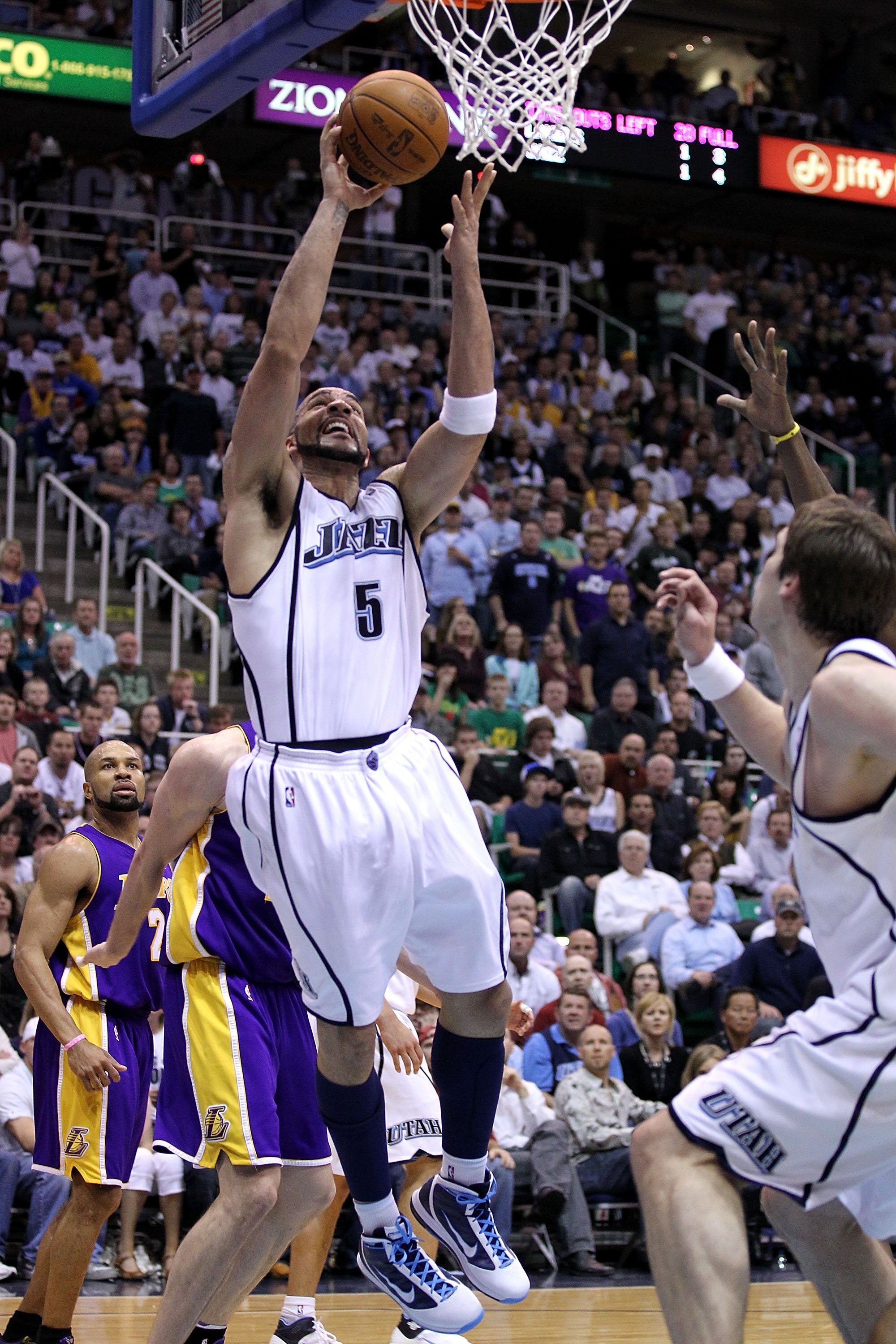 SALT LAKE CITY - MAY 10:  Carlos Boozer #5 of the Utah Jazz shoots against the Los Angeles Lakers during Game Four of the Western Conference Semifinals of the 2010 NBA Playoffs on May 10, 2010 at Energy Solutions Arena in Salt Lake City, Utah. NOTE TO USE