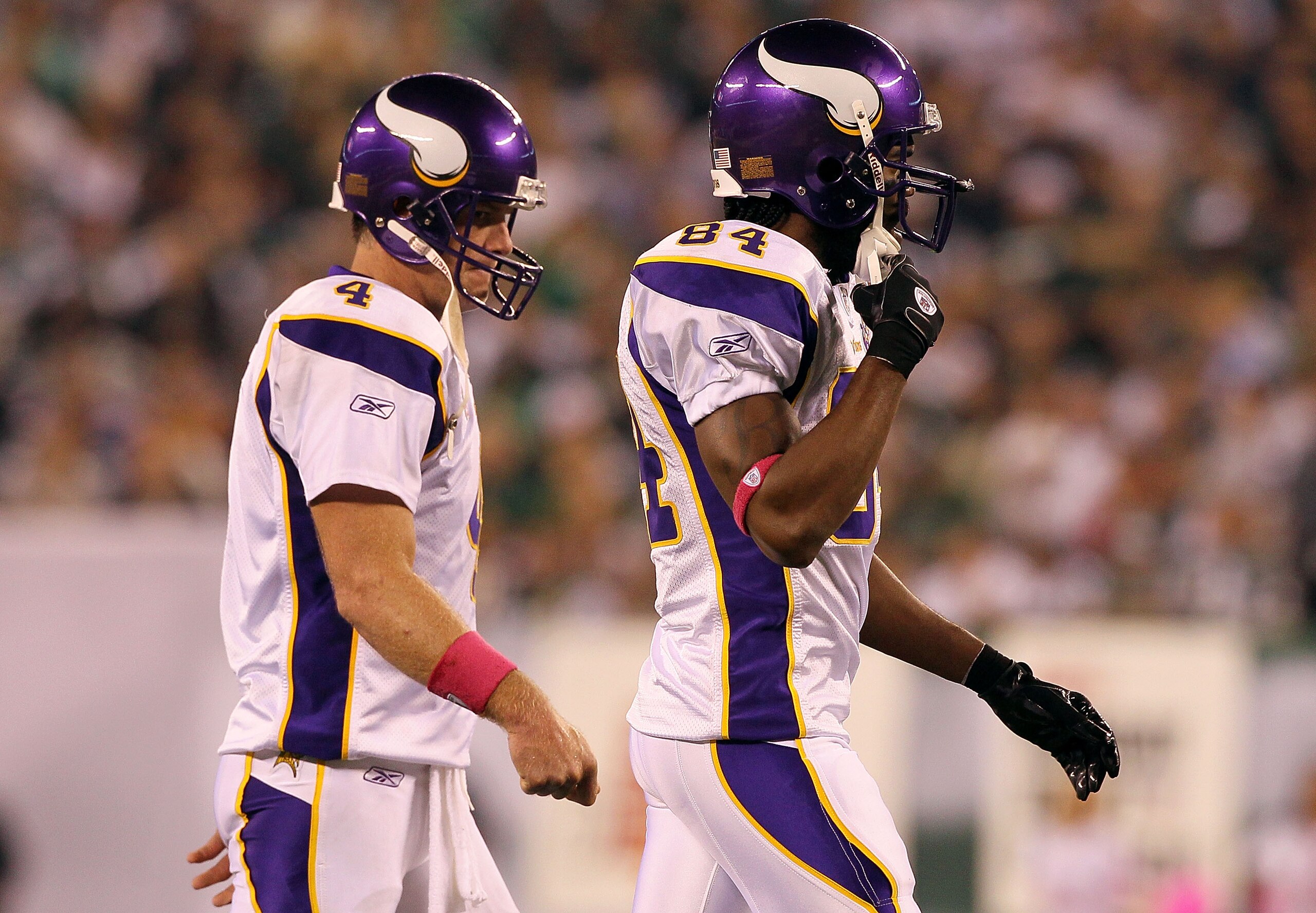 EAST RUTHERFORD, NJ - OCTOBER 11:  (L-R) Brett Favre #4 and Randy Moss #84 of the Minnesota Vikings walk on the field in the second quarter against the New York Jets at New Meadowlands Stadium on October 11, 2010 in East Rutherford, New Jersey.  (Photo by