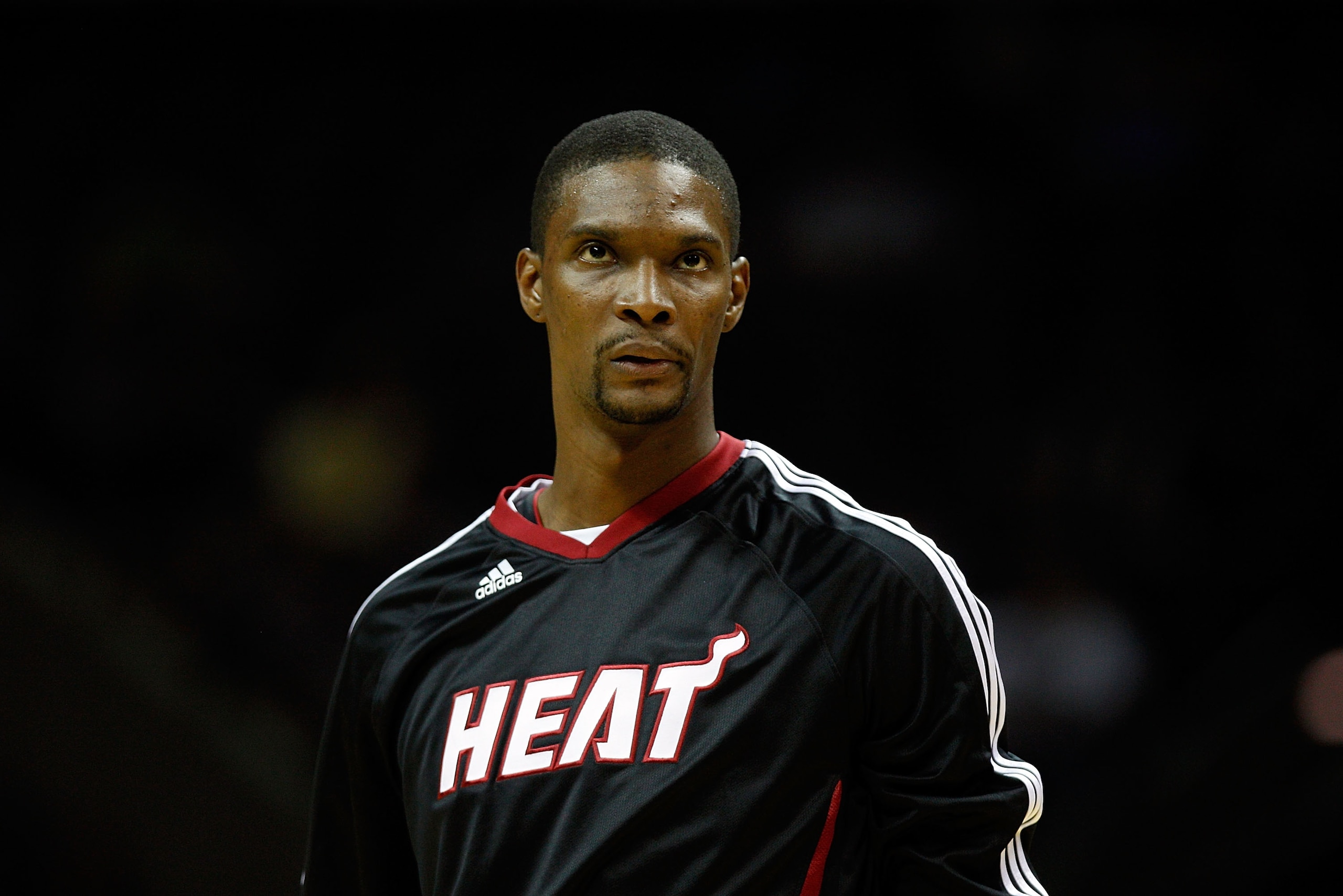 SAN ANTONIO - OCTOBER 09:  Chris Bosh #1 of the Miami Heat warms up before playing the San Antonio Spurs at the AT&T Center on October 9, 2010 in San Antonio, Texas.  NOTE TO USER: User expressly acknowledges and agrees that, by downloading and/or using t