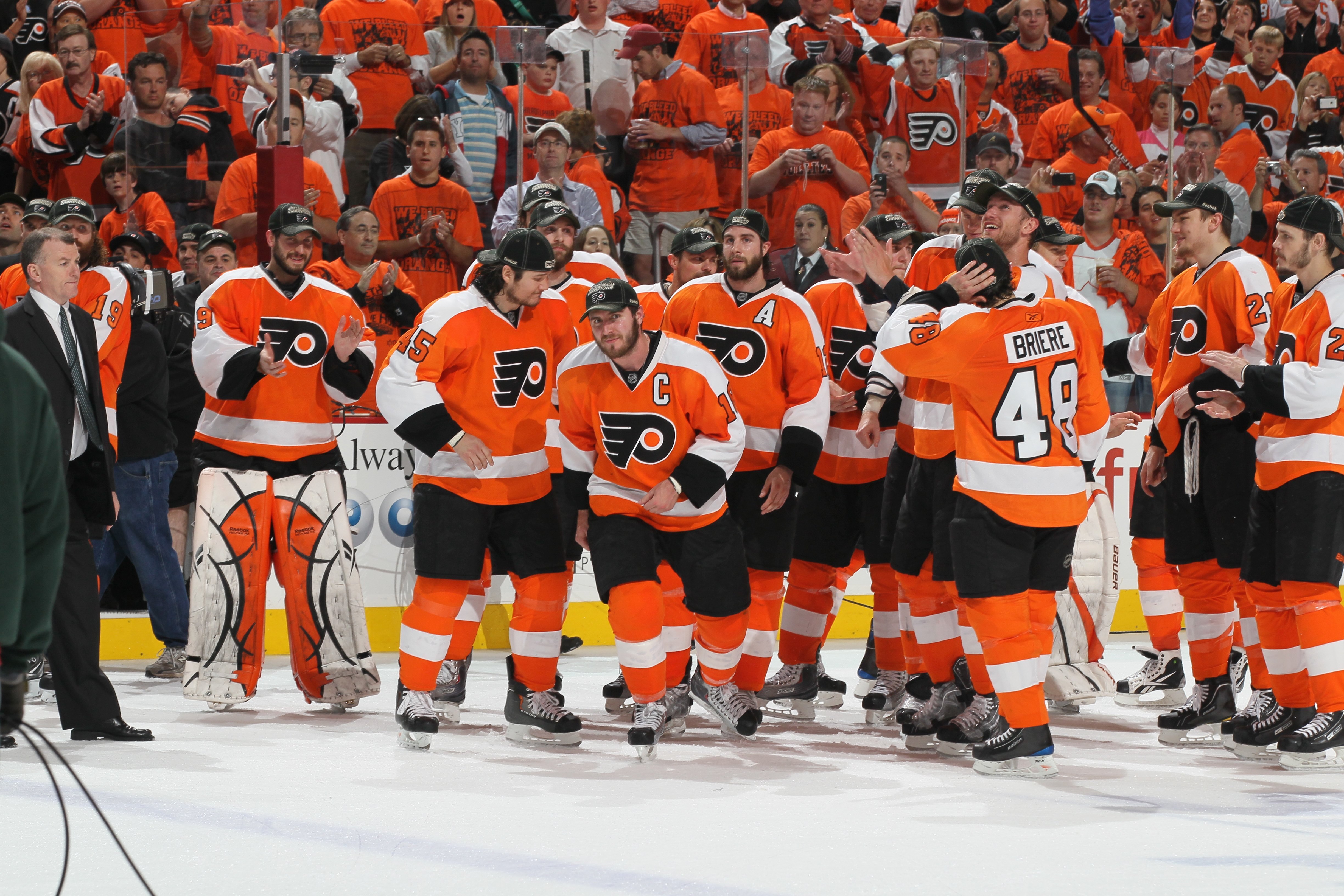 PHILADELPHIA - MAY 24: Captain Mike Richards #18 of the Philadelphia Flyers skates onto the ice after the winning Game 5 of the Eastern Conference Finals against the Montreal Canadiens during the 2010 NHL Stanley Cup Playoffs at Wachovia Center on May 24,