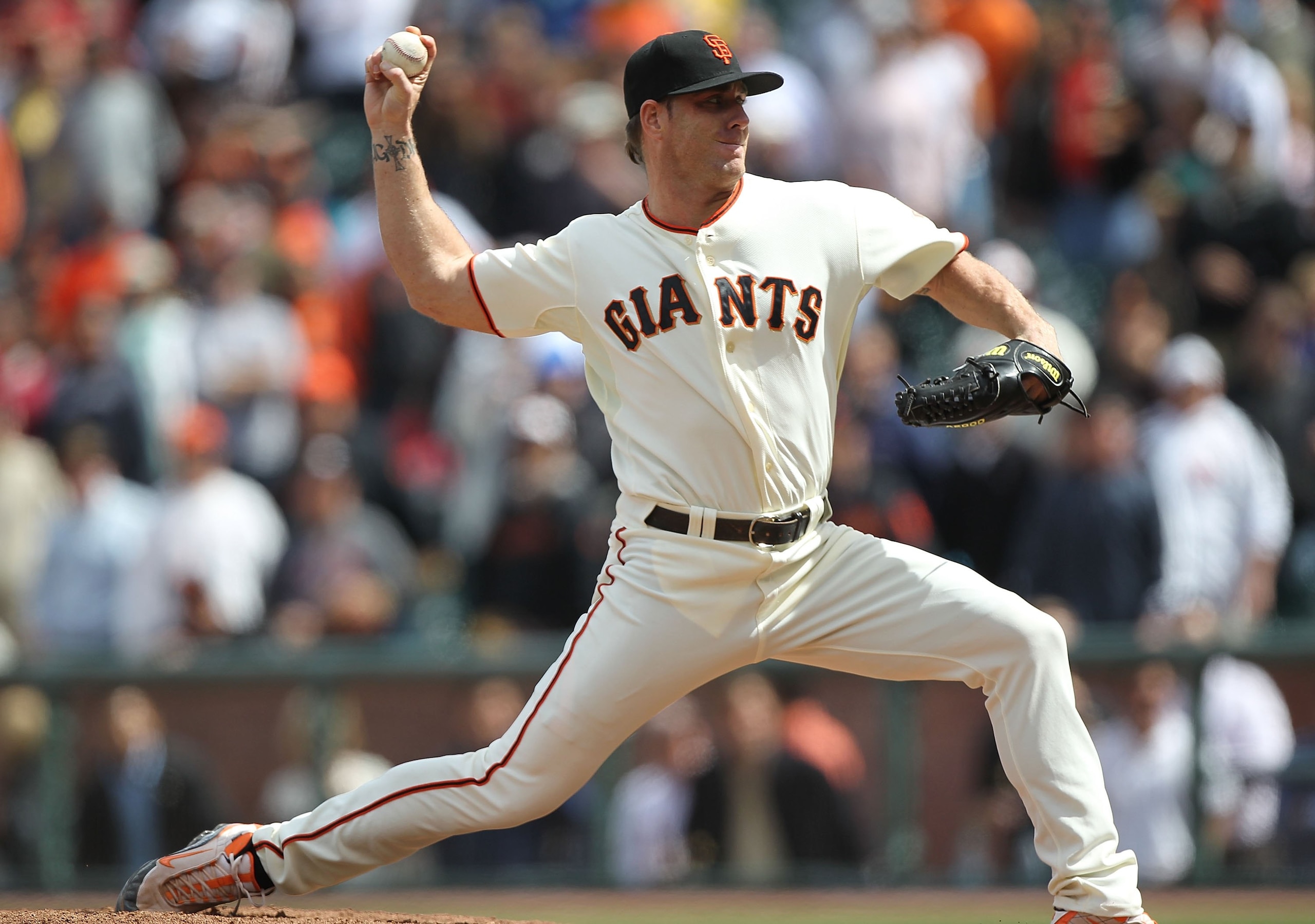 SAN FRANCISCO - MAY 27:  Brain Wilson #38 of the San Francisco Giants pitches against the Washington Nationals during an MLB game at AT&T Park on May 27, 2010 in San Francisco, California.  (Photo by Jed Jacobsohn/Getty Images)