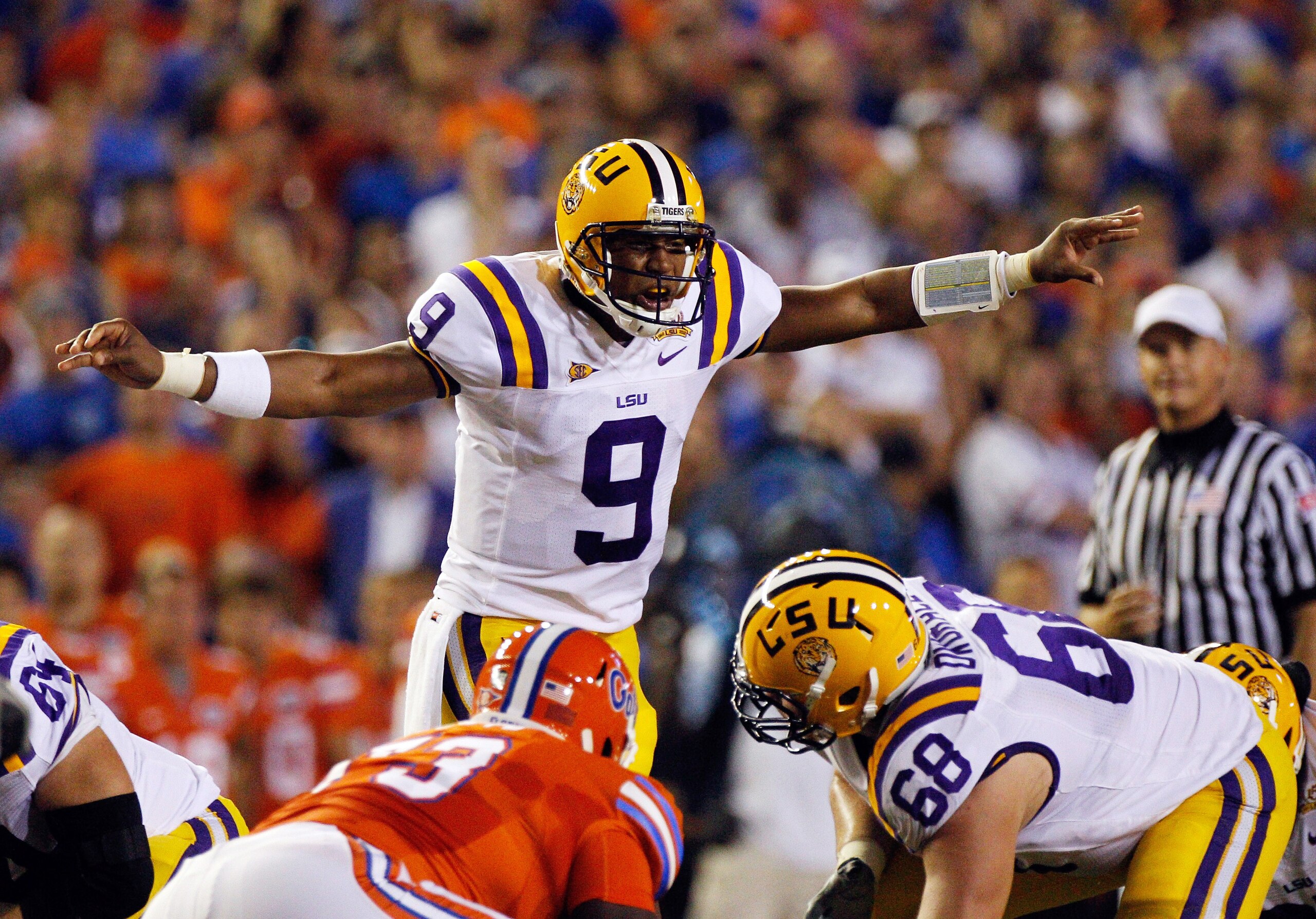 GAINESVILLE, FL - OCTOBER 09:  Quarterback Jordan Jefferson #9 of the Louisiana State University Tigers calls a signal during the game against the Florida Gators at Ben Hill Griffin Stadium on October 9, 2010 in Gainesville, Florida.  (Photo by Sam Greenw