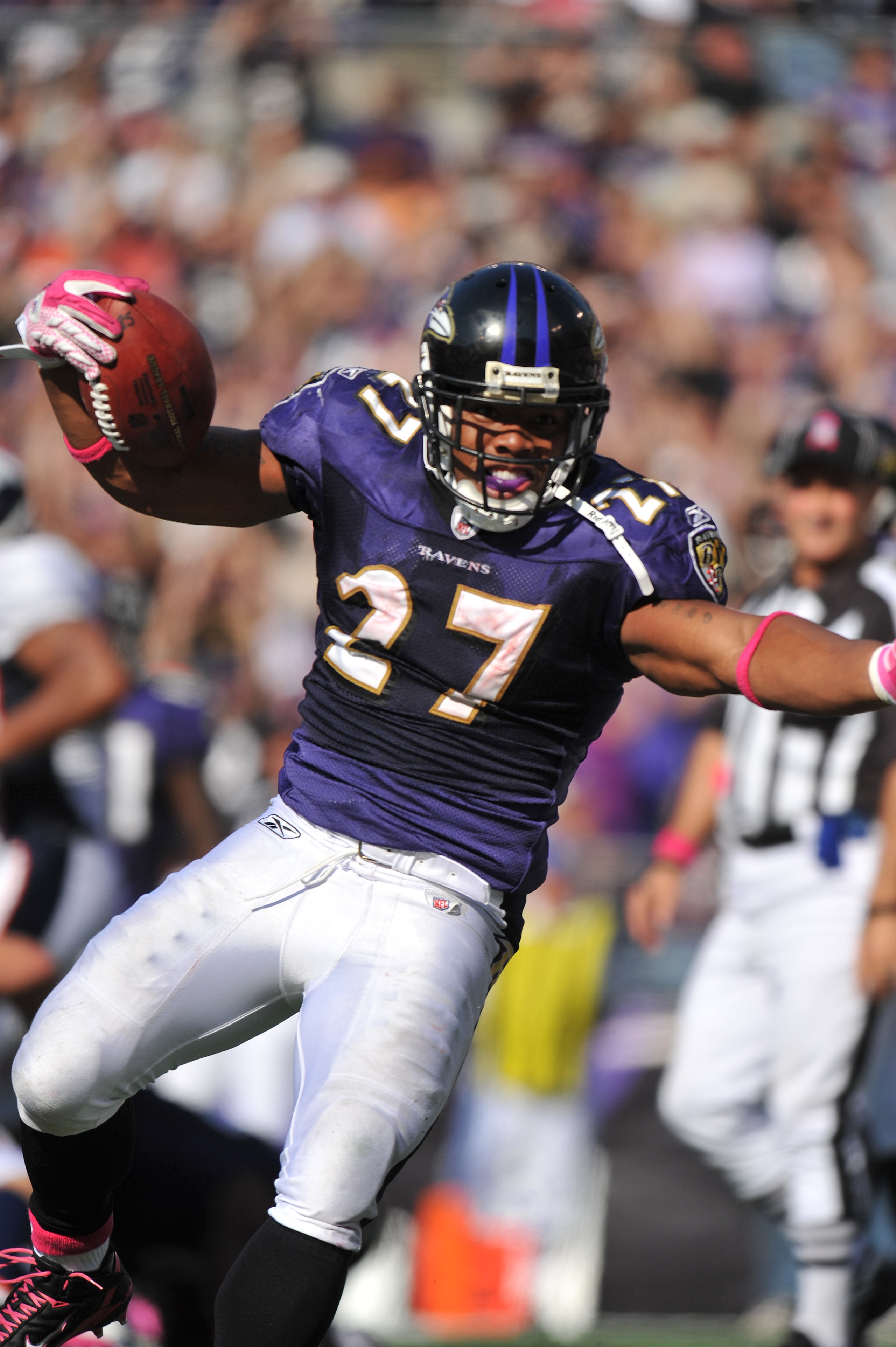 BALTIMORE, MD - OCTOBER 10:  Ray Rice #27 of the Baltimore Ravens celebrates his second touchdown against the Denver Broncos at M&T Bank Stadium on October 10, 2010 in Baltimore, Maryland. Players wore pink in recognition of Breast Cancer Awareness Month.