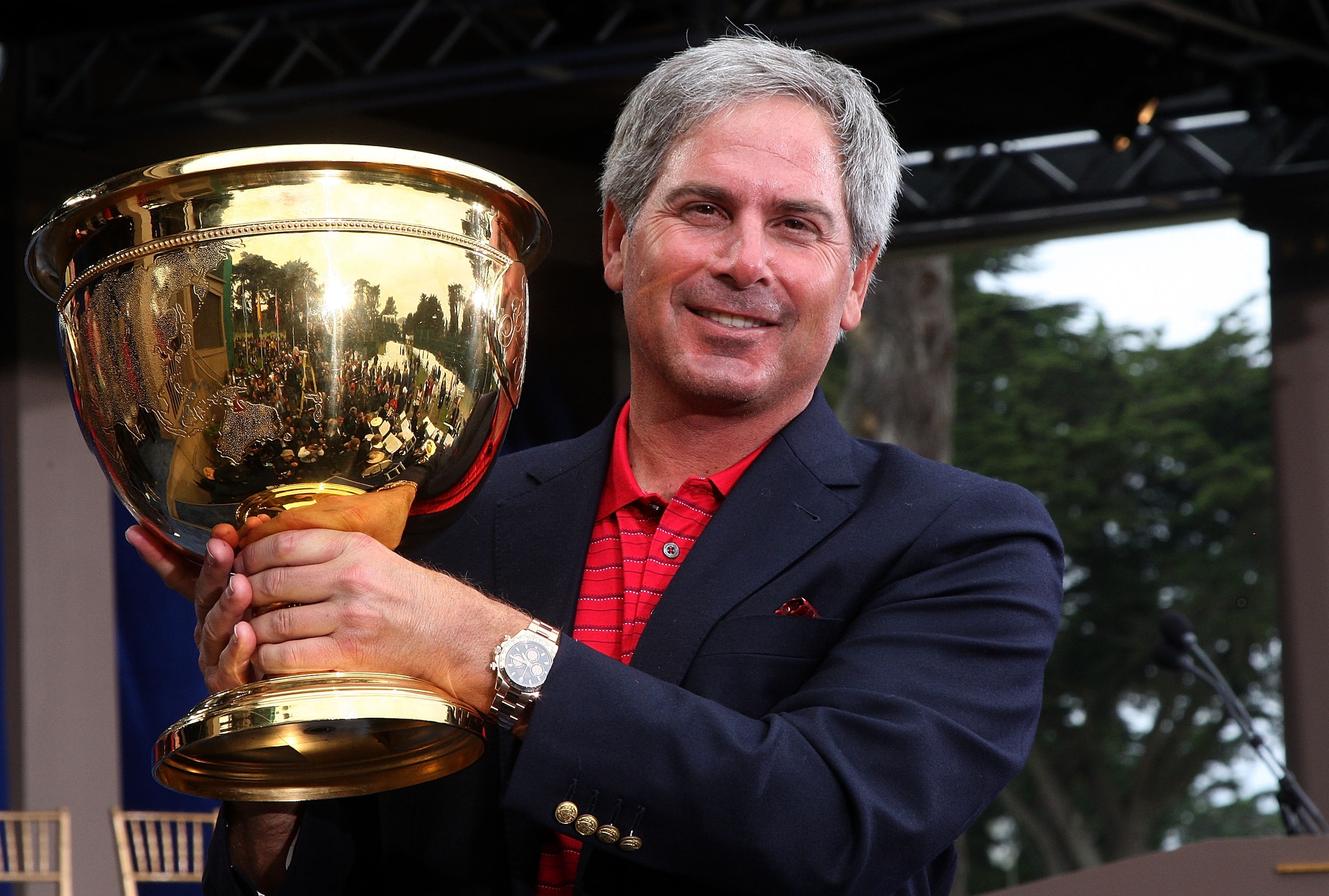 SAN FRANCISCO - OCTOBER 11:  USA Team Captain Fred Couples poses on stage at the closing ceremonies after the USA defeated the International Team 19.5 to 14.5 to win The Presidents Cup at Harding Park Golf Course on October 11, 2009 in San Francisco, Cali