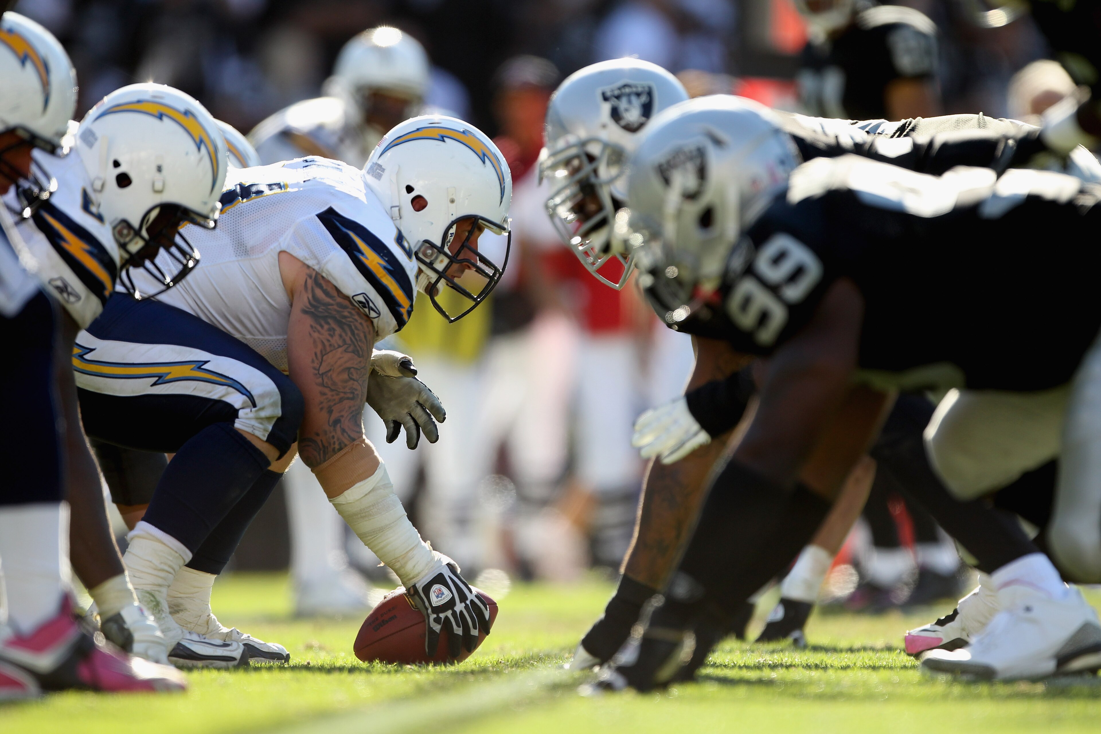 OAKLAND, CA - OCTOBER 10: Nick Hardwick #61 at center and the rest of the San Diego Chargers line up against the Oakland Raiders at Oakland-Alameda County Coliseum on October 10, 2010 in Oakland, California. (Photo by Ezra Shaw/Getty Images) OAKLAND, CA - OCTOBER 10: Nick Hardwick #61 at center and the rest of the San Diego Chargers line up against the Oakland Raiders at Oakland-Alameda County Coliseum on October 10, 2010 in Oakland, California. (Photo by Ezra Shaw/Getty Images)