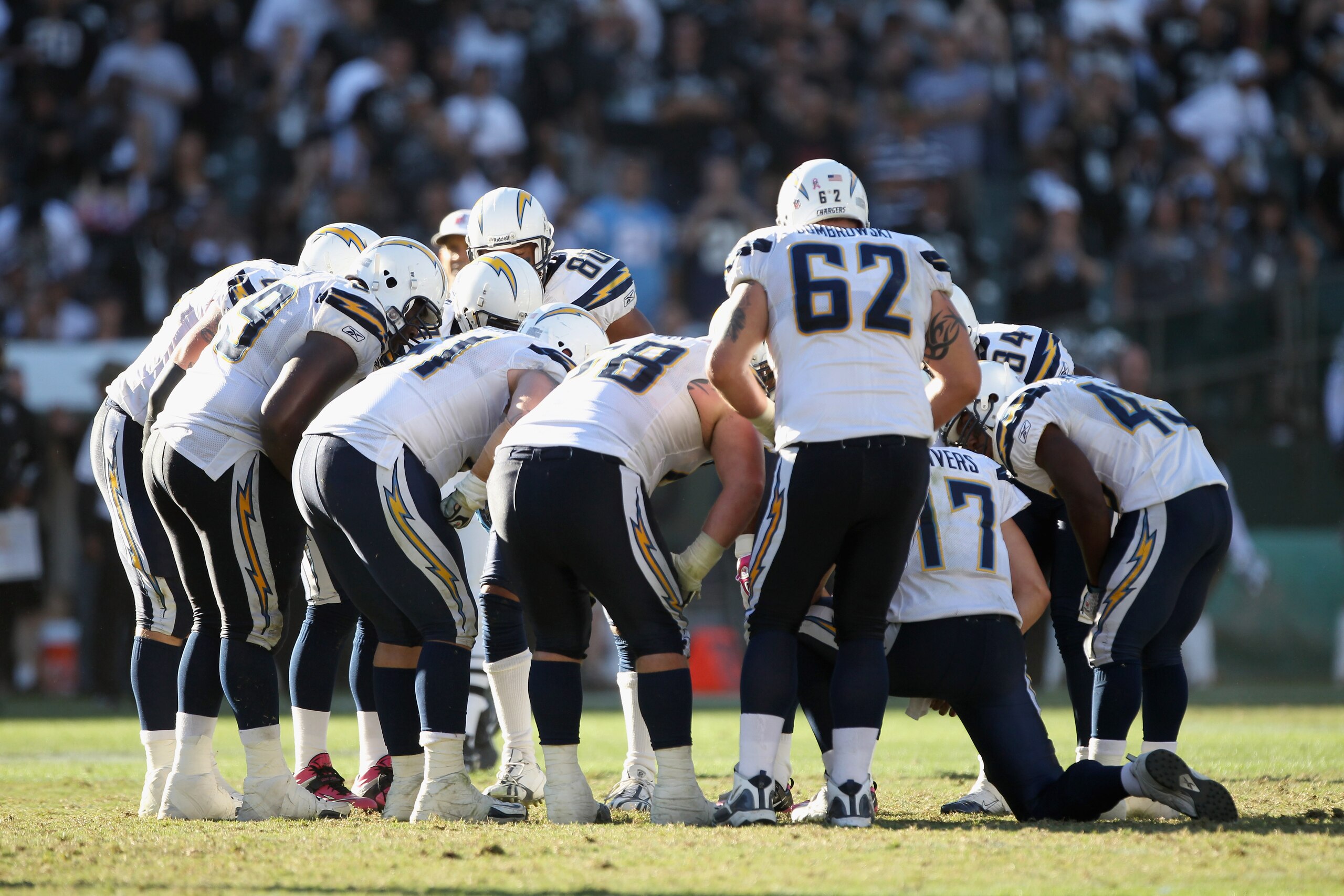 OAKLAND, CA - OCTOBER 10:  Philip Rivers #17 of the San Diego Chargers huddles his team together during their game against the Oakland Raiders at Oakland-Alameda County Coliseum on October 10, 2010 in Oakland, California.  (Photo by Ezra Shaw/Getty Images