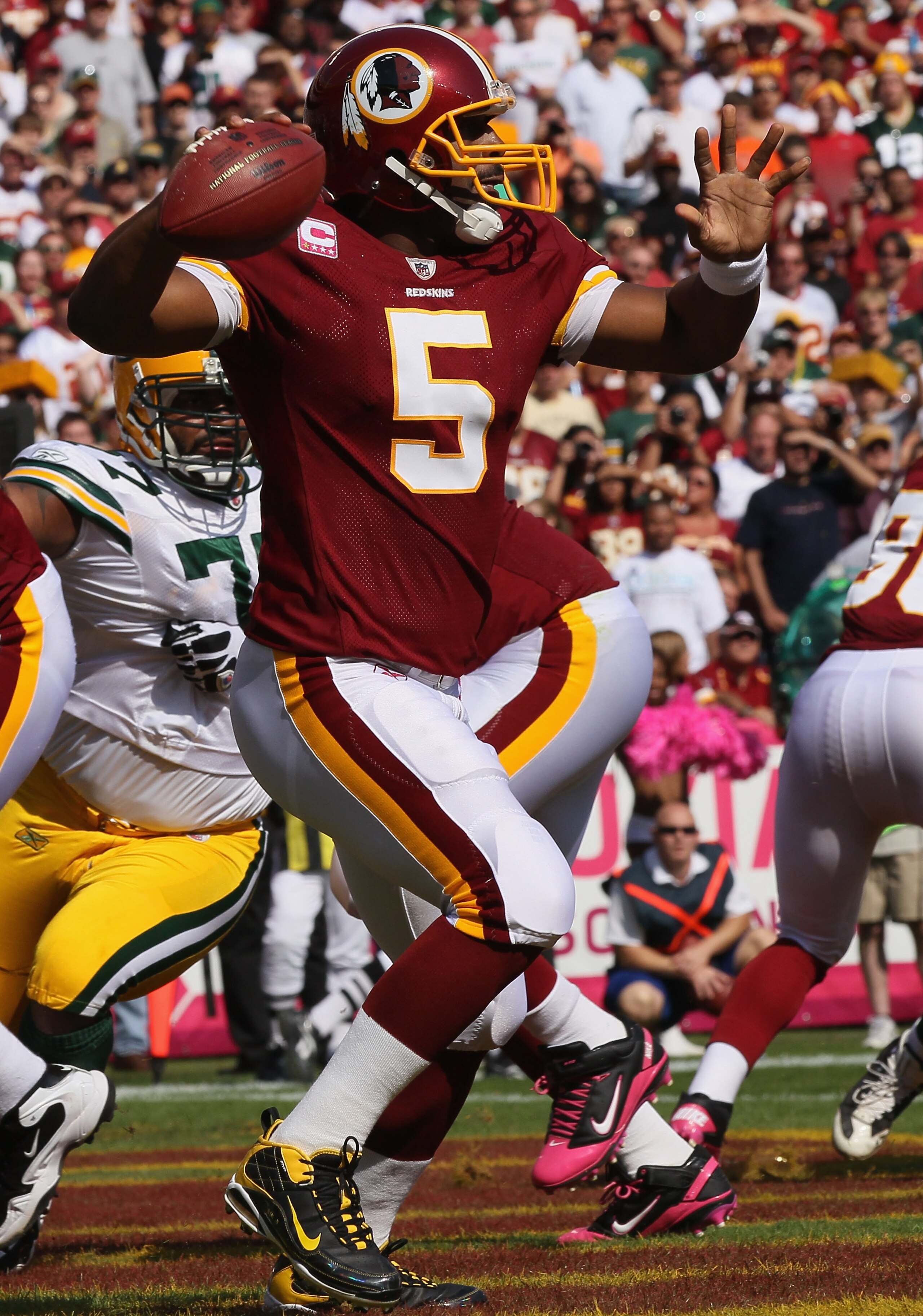 LANDOVER, MD - OCTOBER 10: Donovan McNabb #5 of the Washington Redskins drops back to pass against the Green Bay Packers at FedExField on October 10, 2010 in Landover, Maryland.  (Photo by Win McNamee/Getty Images)