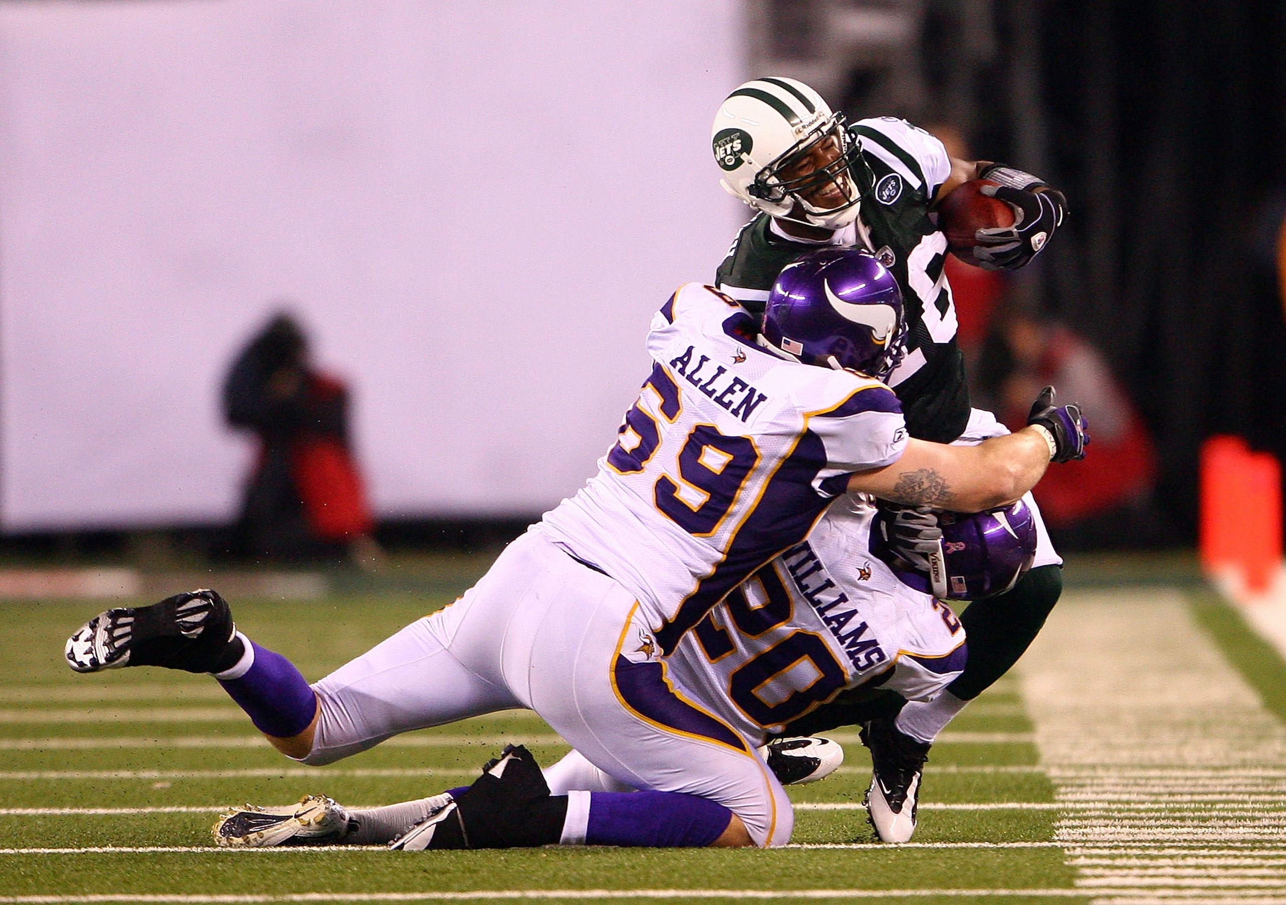 EAST RUTHERFORD, NJ - OCTOBER 11:  Brad Smith #16 of the New York Jets runs for yards after the catch in the second half against Jared Allen #69 and Madieu Williams #20 of the Minnesota Vikings at New Meadowlands Stadium on October 11, 2010 in East Ruther