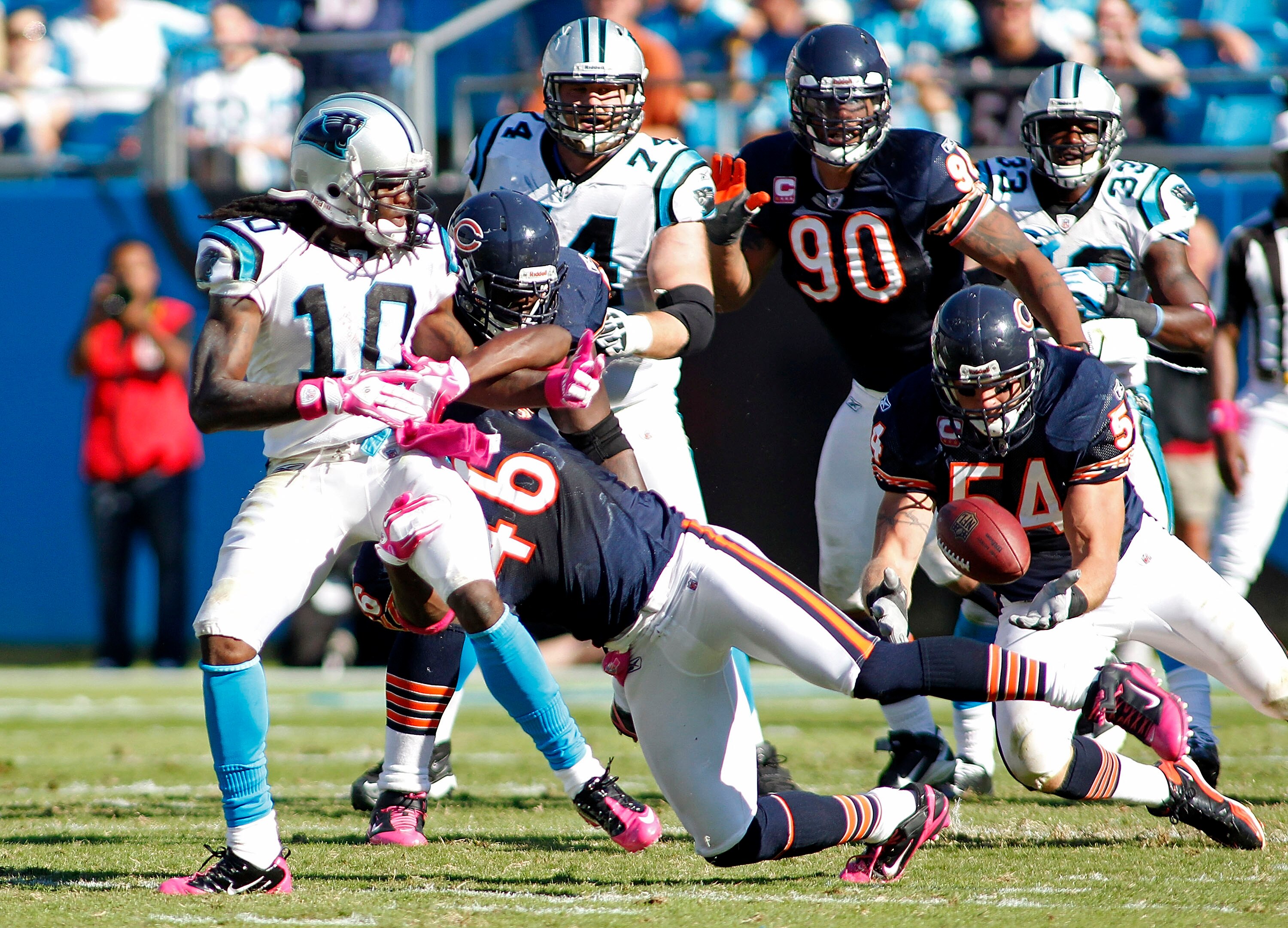 CHARLOTTE, NC - OCTOBER 10: Linebacker Brian Urlacher #54 of the Chicago Bears intercepts a pass intended for wide receiver Armanti Edwards #10 of the Carolina Panthers at Bank of America Stadium on October 10, 2010 in Charlotte, North Carolina. (Photo by