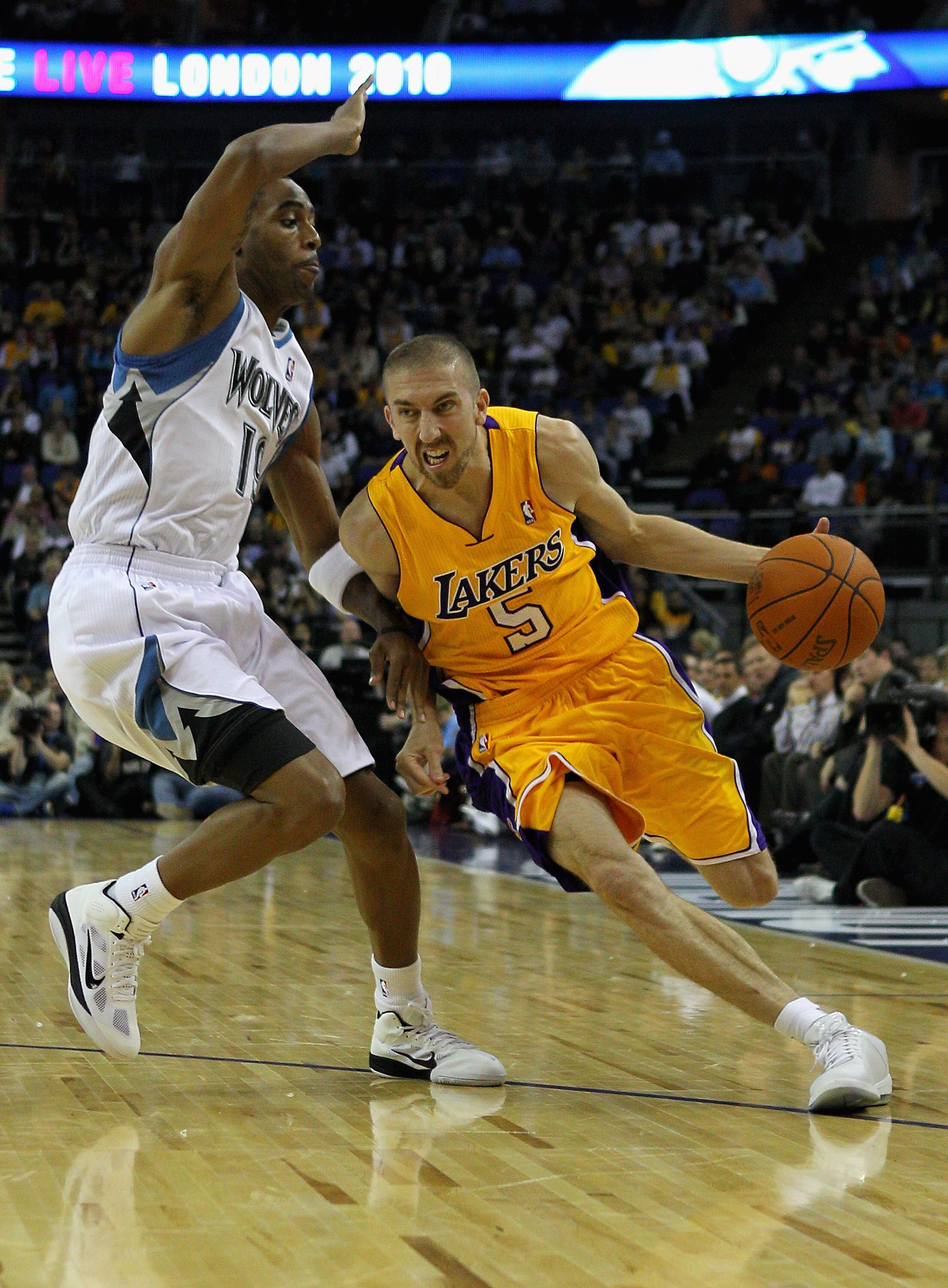LONDON, ENGLAND - OCTOBER 04:  Steve Blake of the Los Angeles Lakers (R) in action during the NBA Europe Live match between the Los Angeles Lakers and the Minnesota Timberwolves at the O2 arena on October 4, 2010 in London, England.  (Photo by Clive Rose/