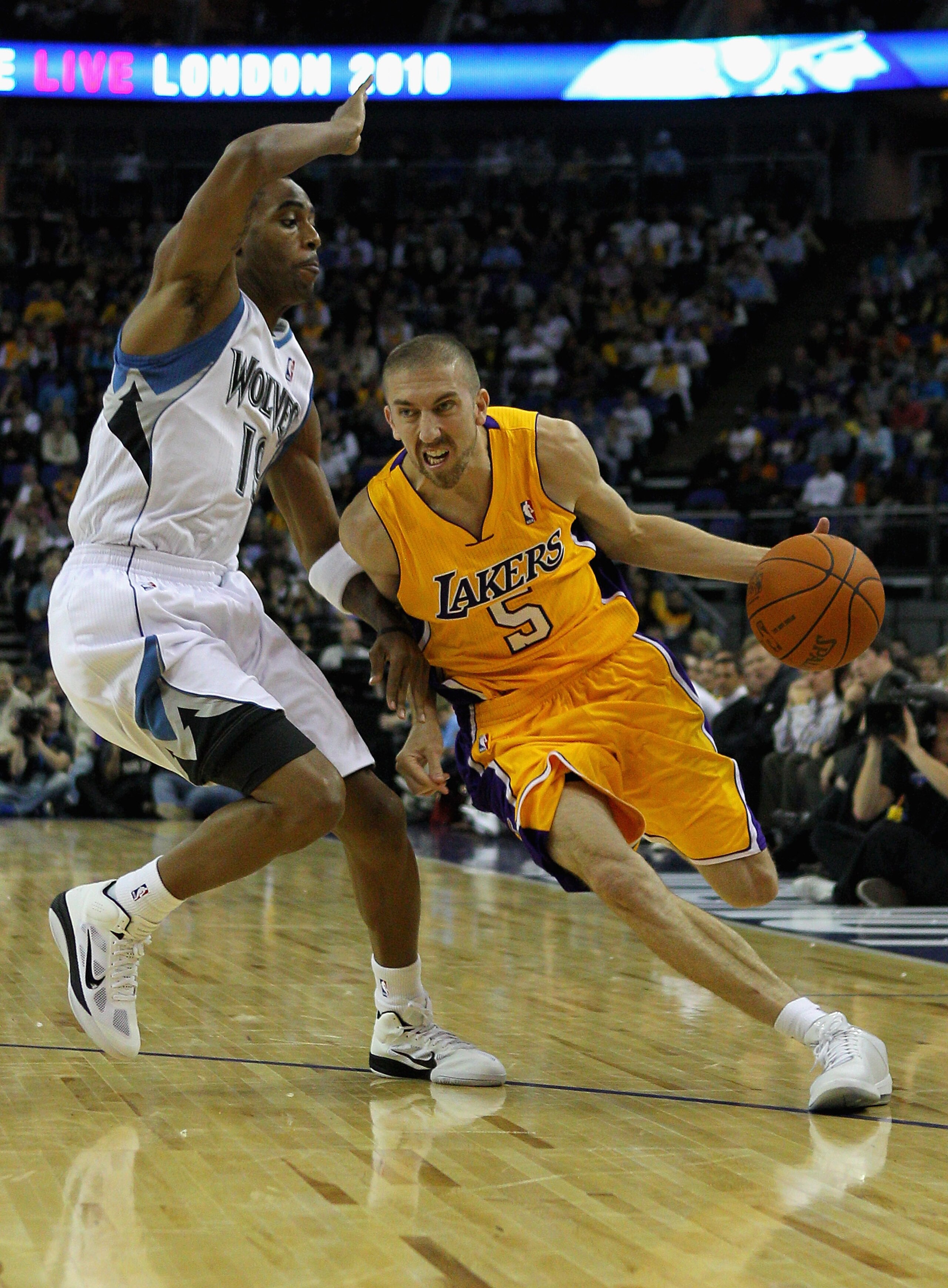 LONDON, ENGLAND - OCTOBER 04:  Steve Blake of the Los Angeles Lakers (R) in action during the NBA Europe Live match between the Los Angeles Lakers and the Minnesota Timberwolves at the O2 arena on October 4, 2010 in London, England.  (Photo by Clive Rose/