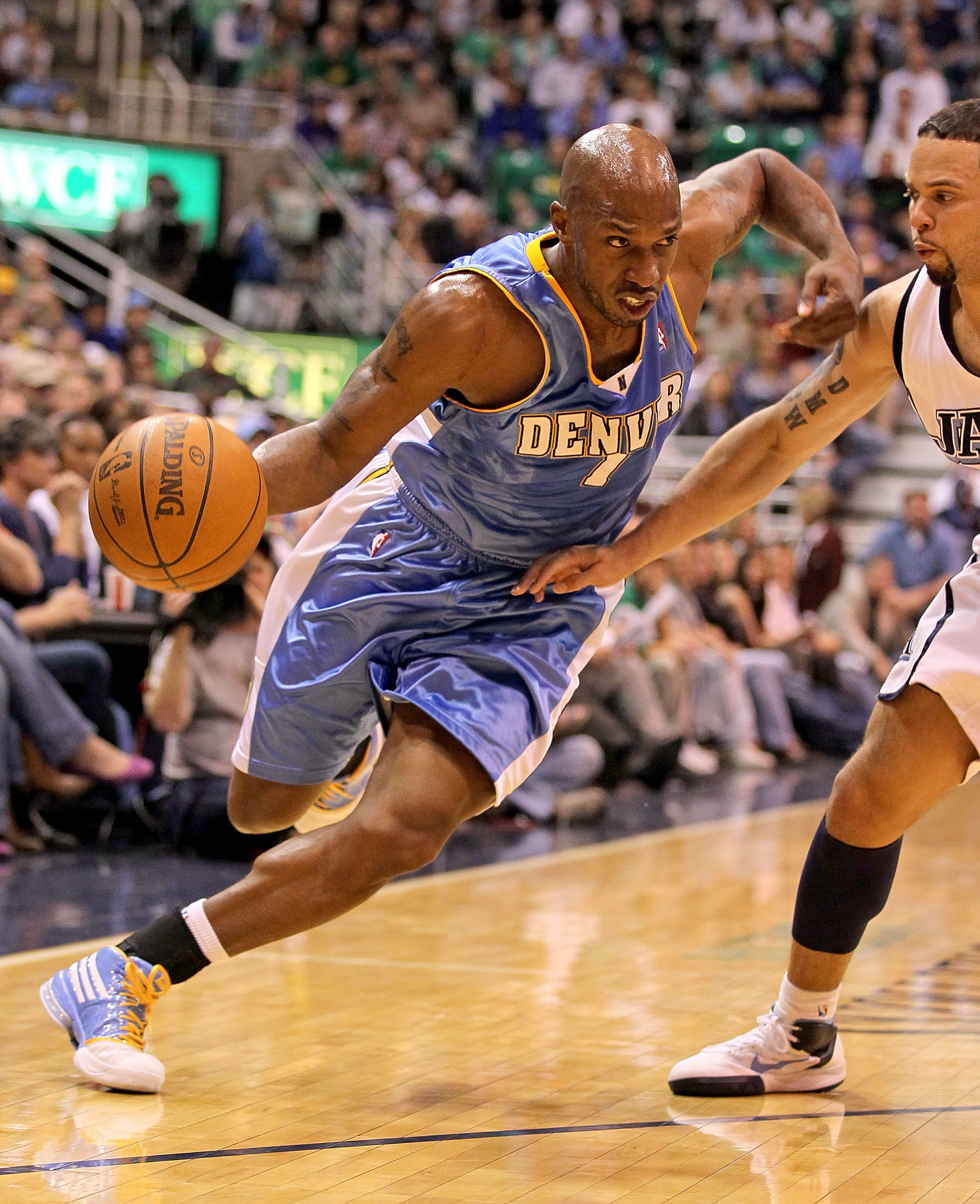SALT LAKE CITY - APRIL 25:  Chauncey Billups #1 of the Denver Nuggets dribbles the ball while defended by Deron Williams #8 of the Utah Jazz during  Game Four of the Western Conference Quarterfinals of the 2010 NBA Playoffs at EnergySolutions Arena on Apr