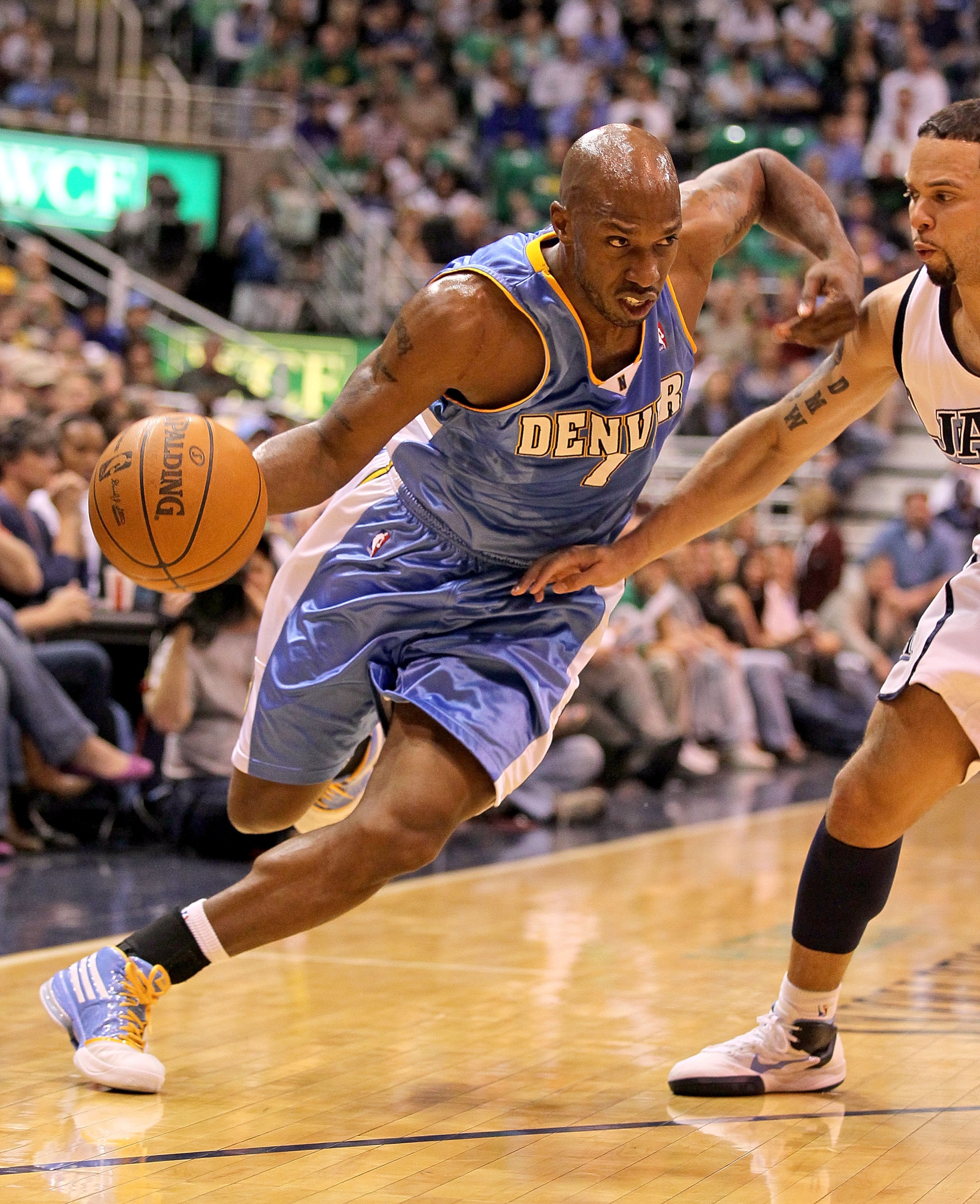 SALT LAKE CITY - APRIL 25:  Chauncey Billups #1 of the Denver Nuggets dribbles the ball while defended by Deron Williams #8 of the Utah Jazz during  Game Four of the Western Conference Quarterfinals of the 2010 NBA Playoffs at EnergySolutions Arena on Apr