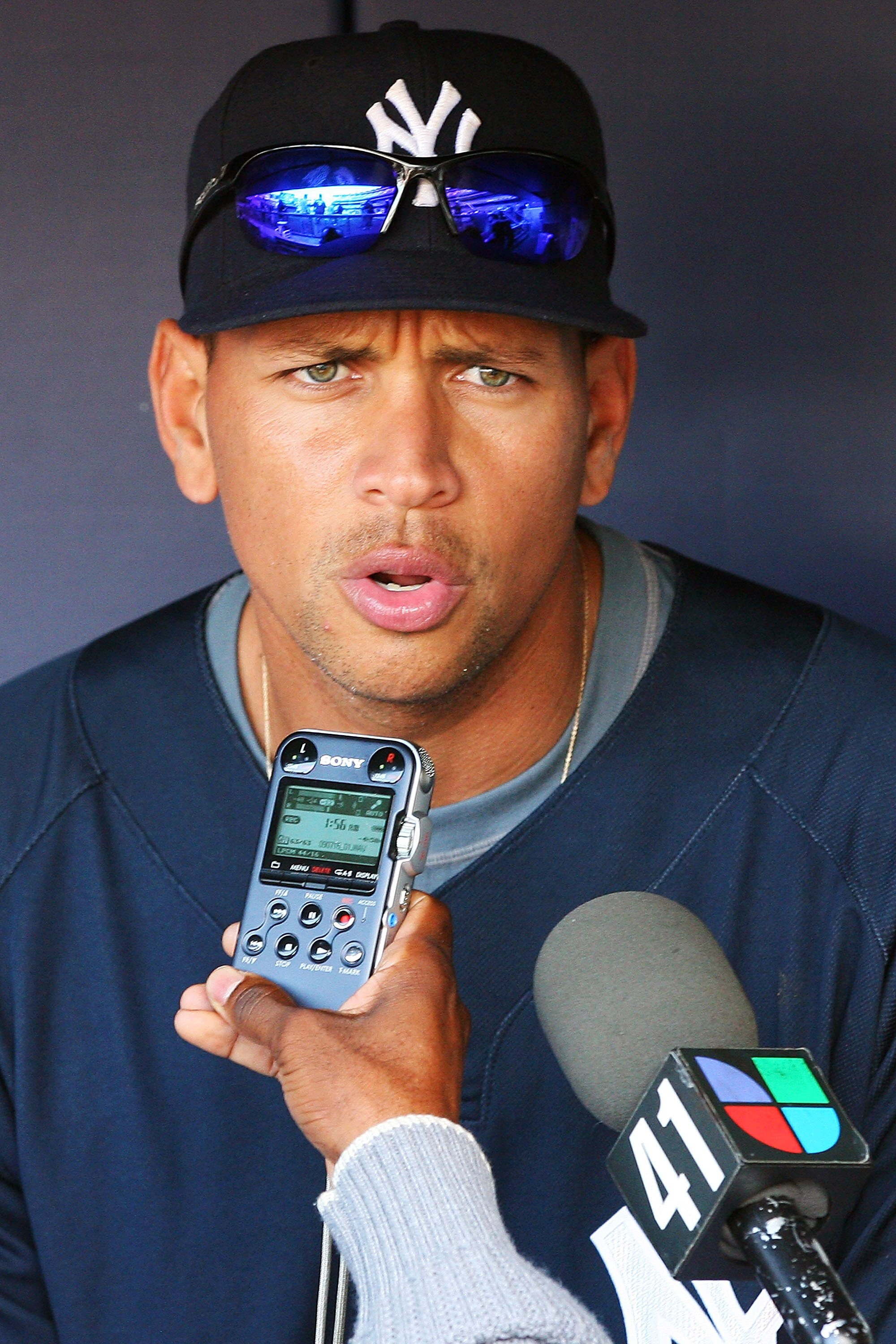 NEW YORK - OCTOBER 12:  Alex Rodriquez #13 of the New York Yankees answers questions from the press during a workout session at Yankee Stadium on October 12, 2010 in the Bronx borough of New York City.  (Photo by Andrew Burton/Getty Images)