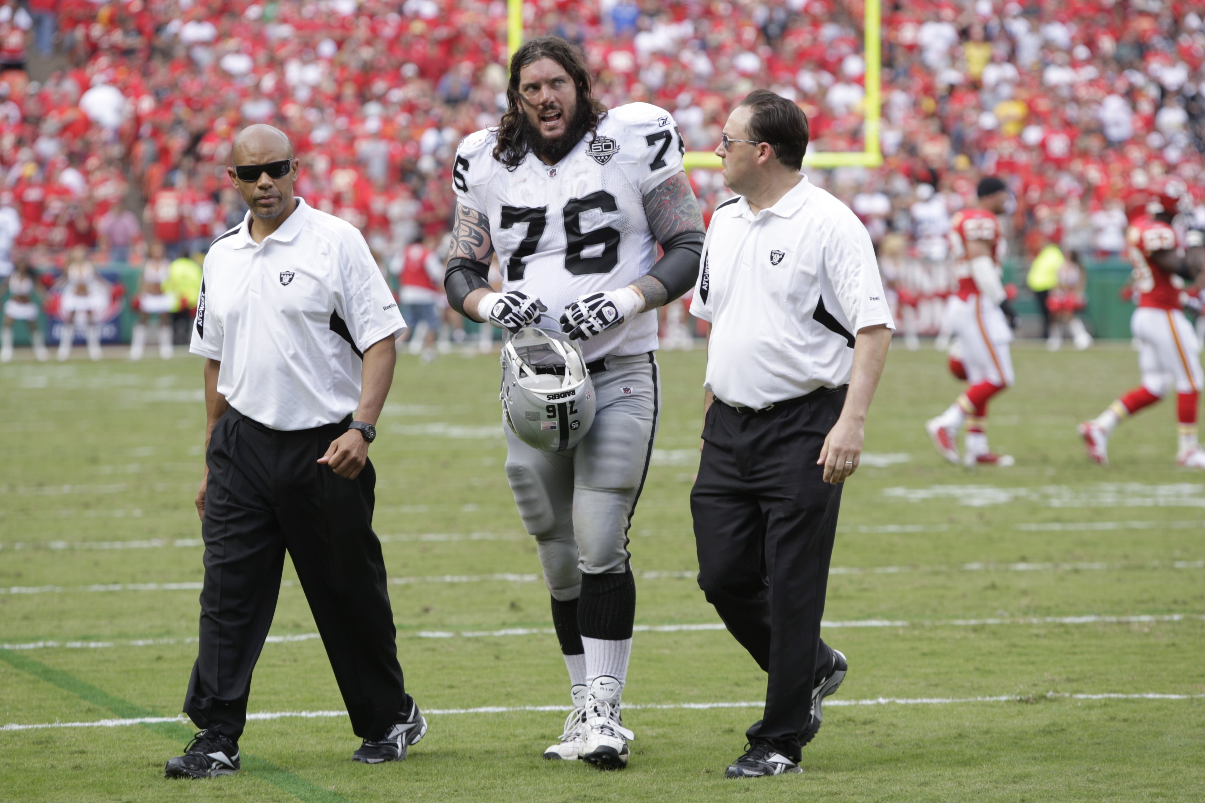 KANSAS CITY, MO - SEPTEMBER 20:  Robert Gallery #76 of the Oakland Raiders walks off the field during the game against the Kansas City Chiefs at Arrowhead Stadium on September 20, 2009 in Kansas City, Missouri. (Photo by Jamie Squire/Getty Images)