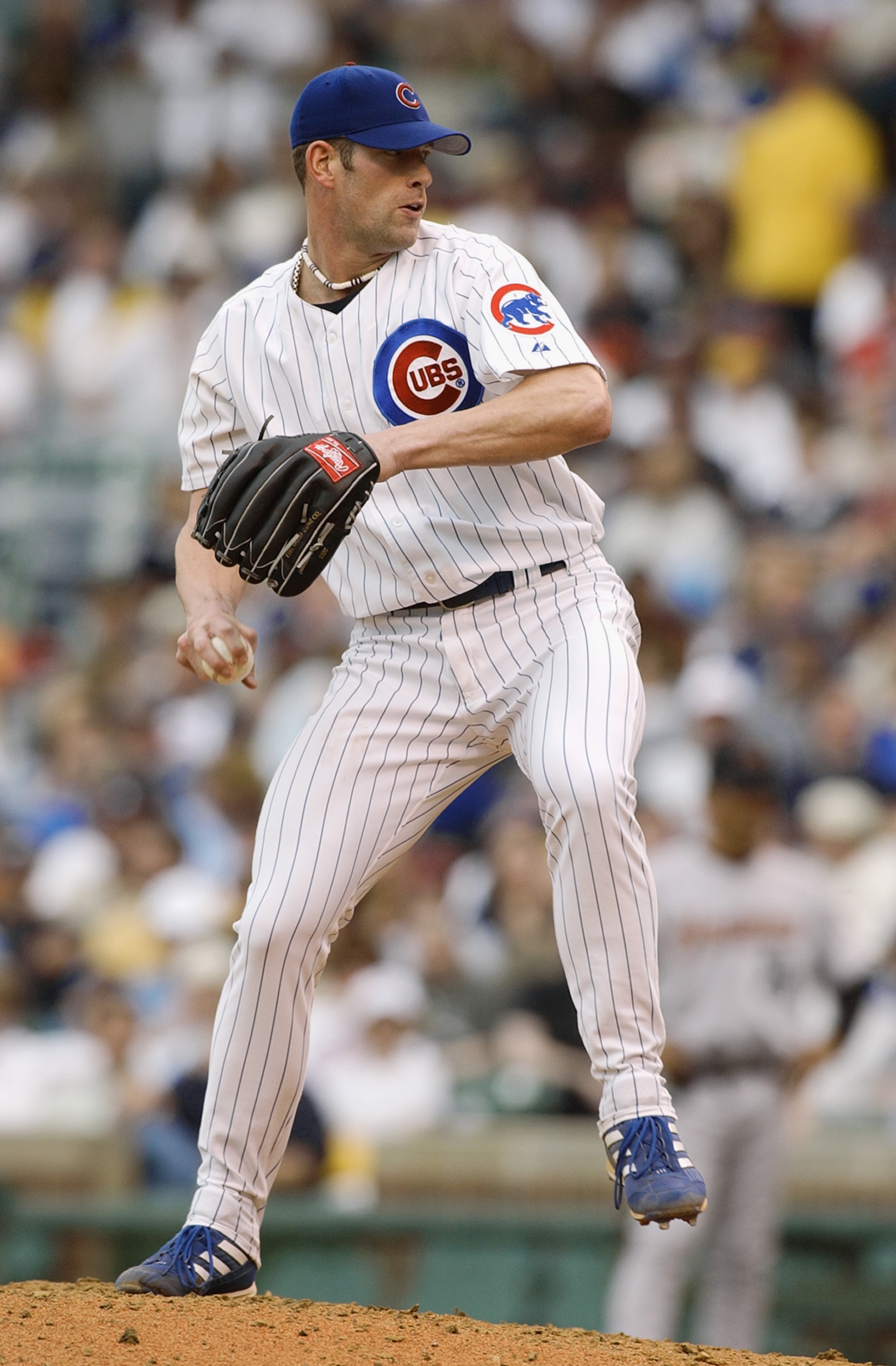CHICAGO - MAY 30:  Kyle Farnsworth #44 of the Chicago Cubs pitches during a game against the Houston Astros on May 30, 2003 at Wrigley Field in Chicago, Illinois. The Astros defeated the Cubs 9-1. (Photo by Jonathan Daniel/Getty Images)