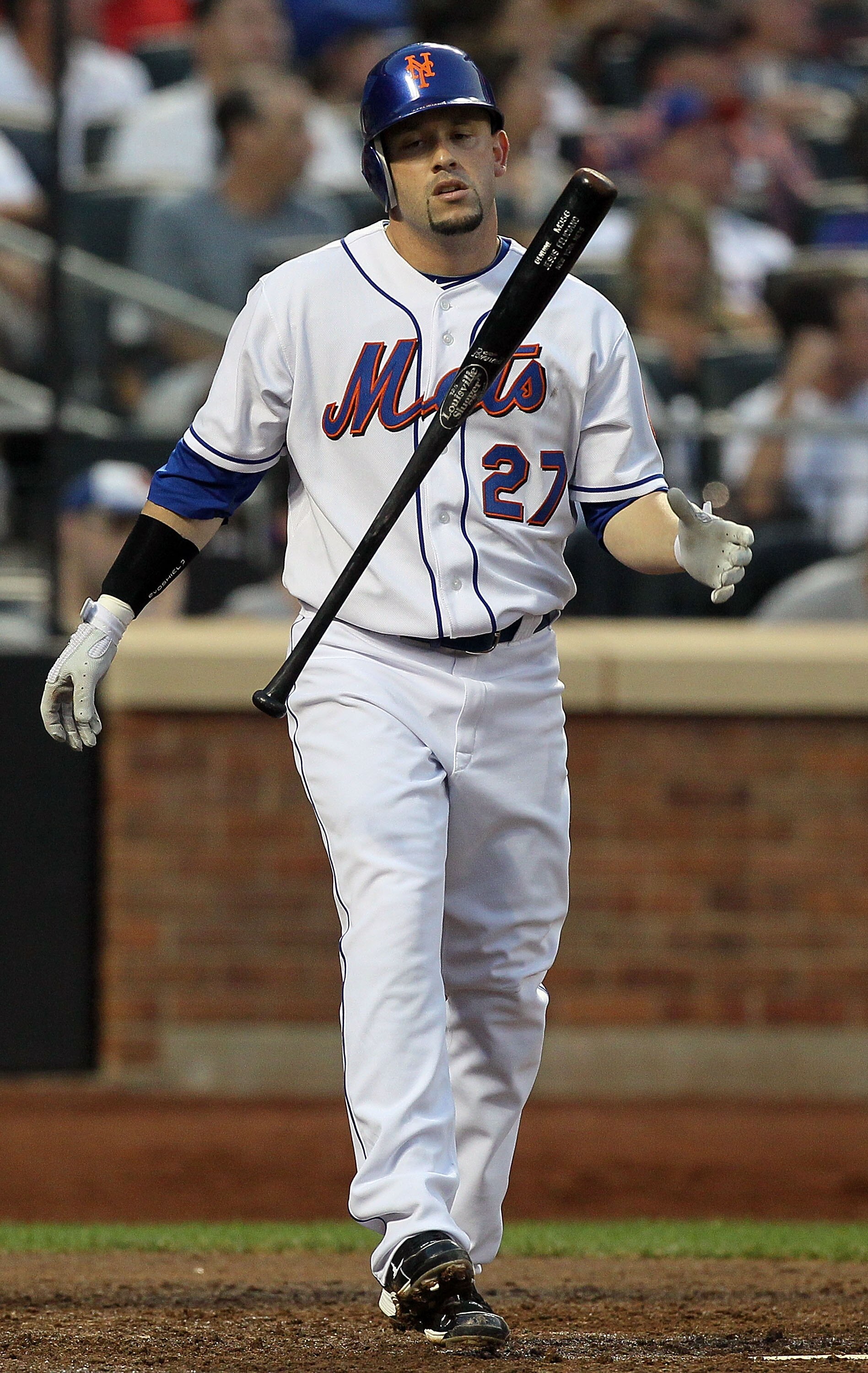 NEW YORK - JULY 07:  Jesus Feliciano #27 of the New York Mets bats against the Cincinnati Reds on July 7, 2010 at Citi Field in the Flushing neighborhood of the Queens borough of New York City. The Reds defeated the Mets 3-1.  (Photo by Jim McIsaac/Getty 