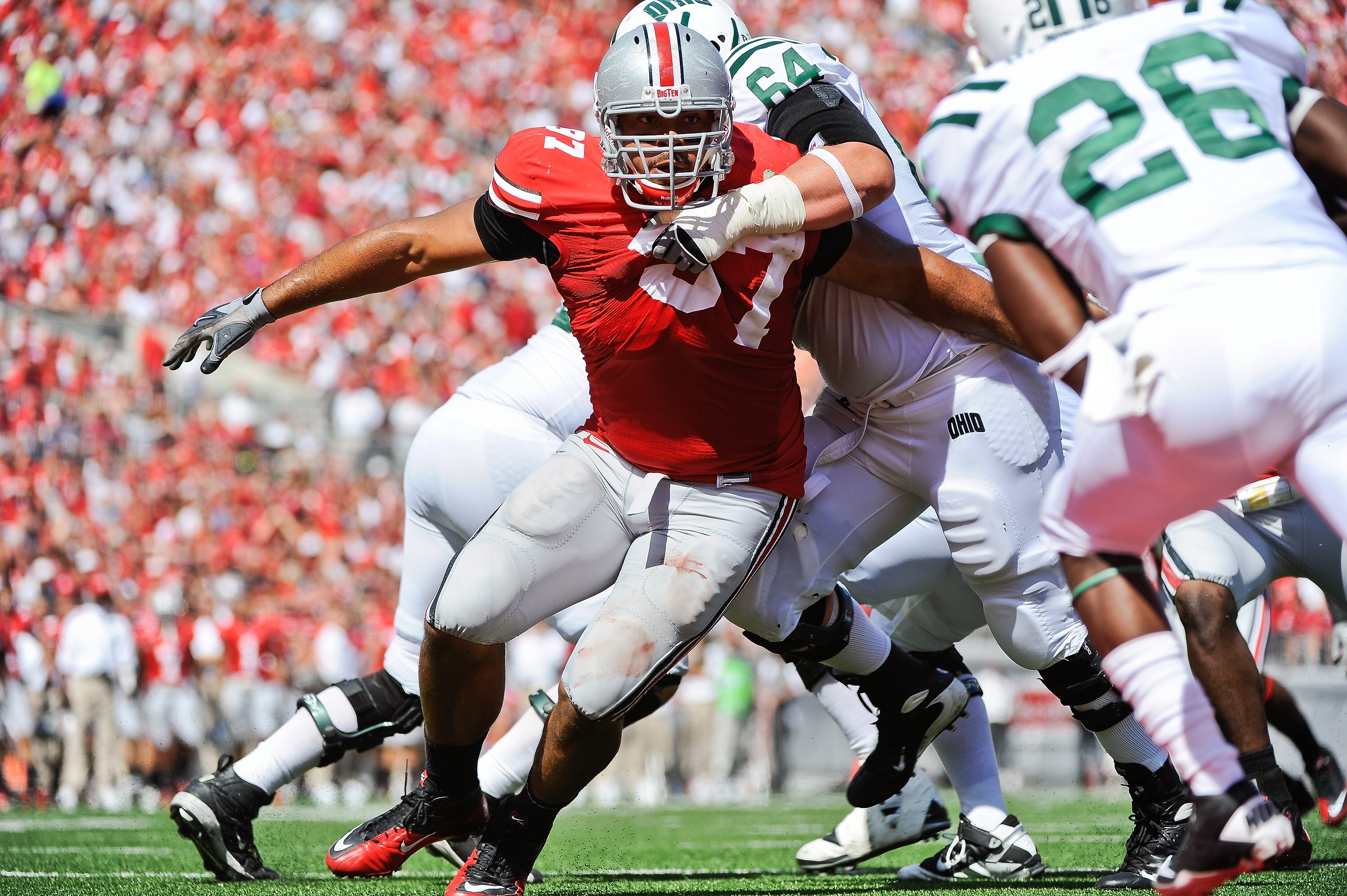 COLUMBUS, OH - SEPTEMBER 18:  Cameron Heyward #97 of the Ohio State Buckeyes chases after the ballcarrier against the Ohio Bobcats at Ohio Stadium on September 18, 2010 in Columbus, Ohio.  (Photo by Jamie Sabau/Getty Images)