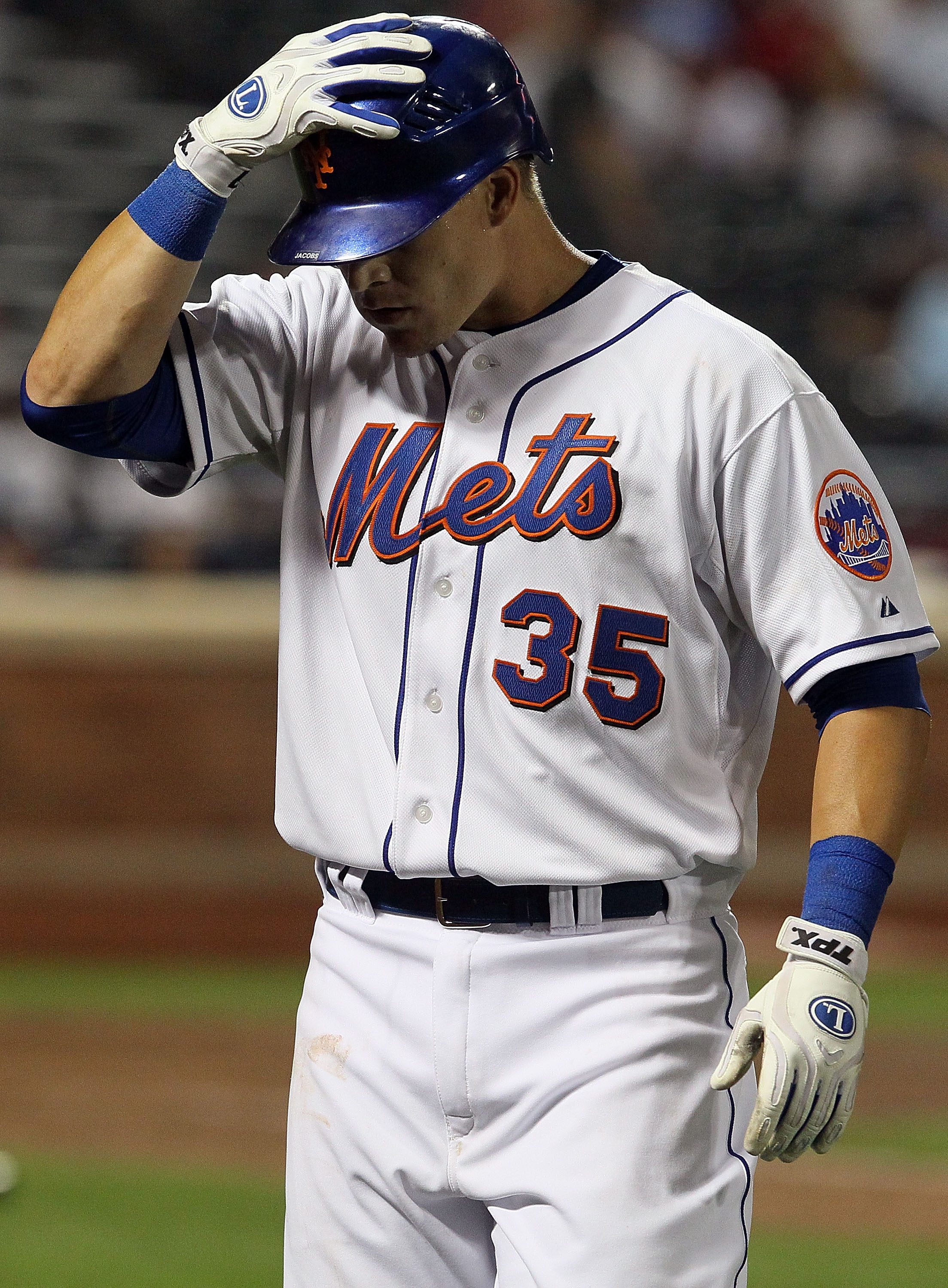 NEW YORK - APRIL 07:  Mike Jacobs #35 of the New York Mets reacts to popping out late in the game against the Florida Marlins on April 7, 2010 at Citi Field in the Flushing neighborhood of the Queens borough of New York City.  (Photo by Jim McIsaac/Getty 