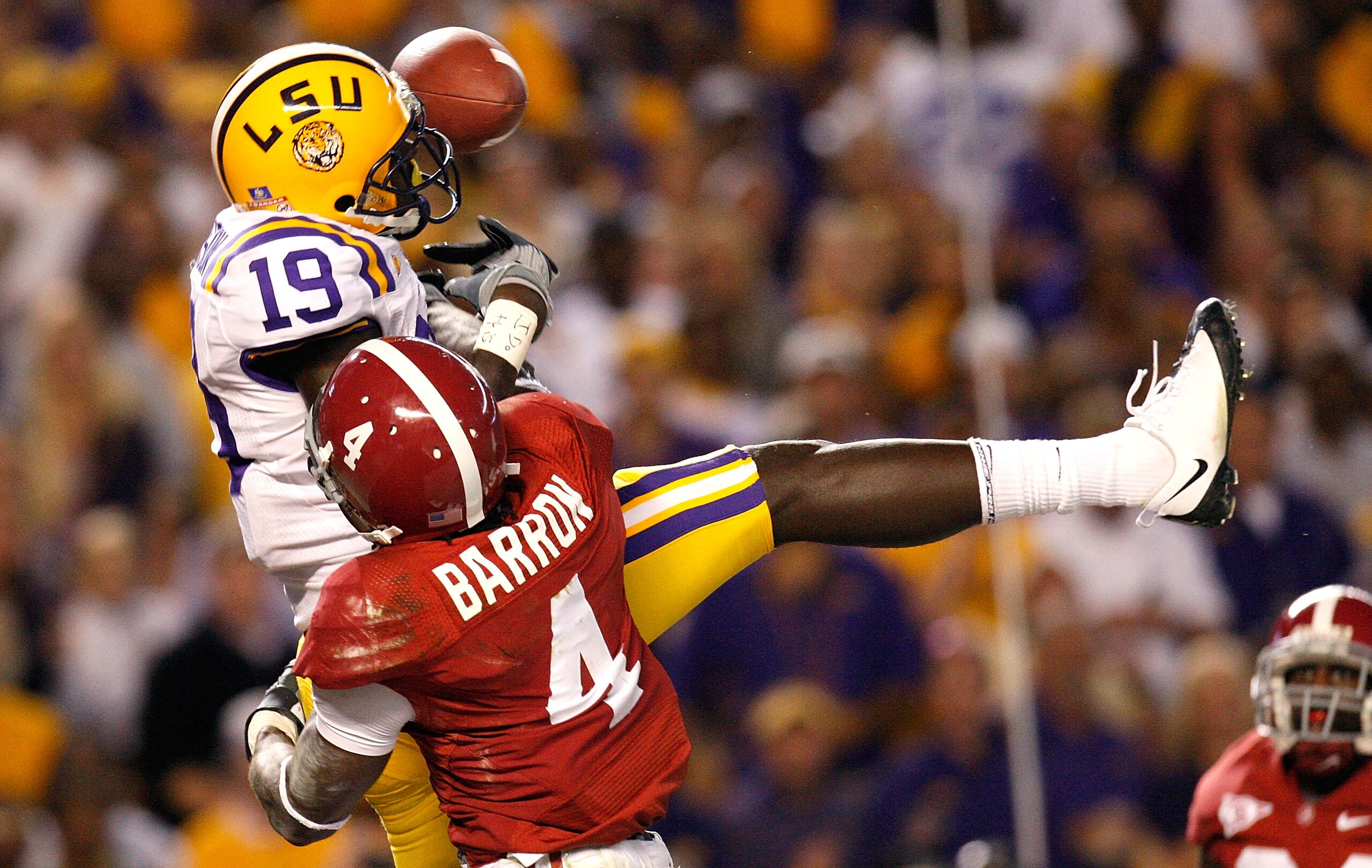 TUSCALOOSA, AL - NOVEMBER 07: David Detz #19 of the Louisiana State University Tigers fails to pull in this touchdown reception against Mark Barron #4 of the Alabama Crimson Tide at Bryant-Denny Stadium on November 7, 2009 in Tuscaloosa, Alabama. (Photo TUSCALOOSA, AL - NOVEMBER 07: David Detz #19 of the Louisiana State University Tigers fails to pull in this touchdown reception against Mark Barron #4 of the Alabama Crimson Tide at Bryant-Denny Stadium on November 7, 2009 in Tuscaloosa, Alabama. (Photo