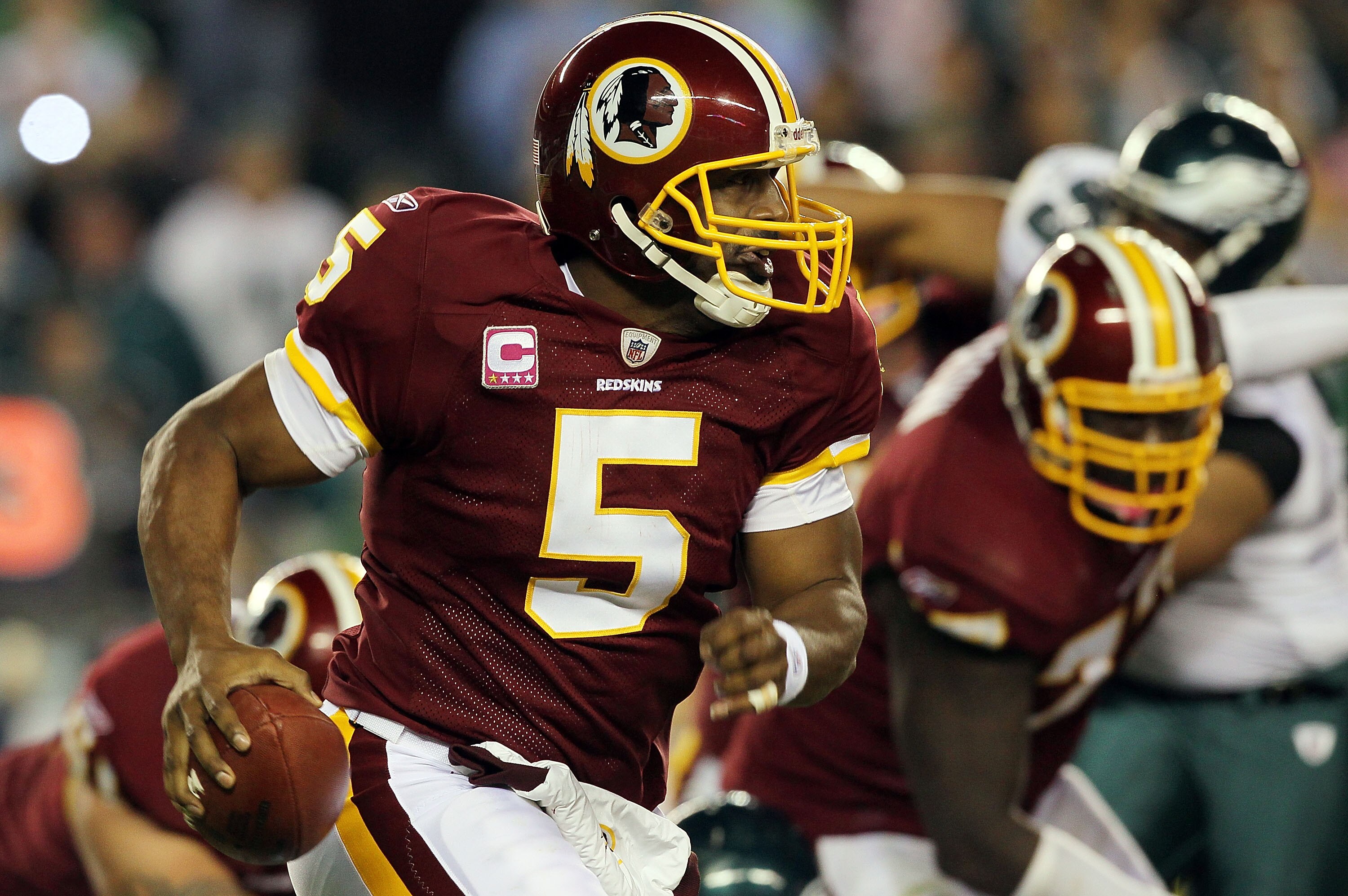 PHILADELPHIA - OCTOBER 03:  Donovan McNabb #5 of the Washington Redskins runs 18 yards for a first down in the second half against the Philadelphia Eagles on October 3, 2010 at Lincoln Financial Field in Philadelphia, Pennsylvania. The Redskins defeated t