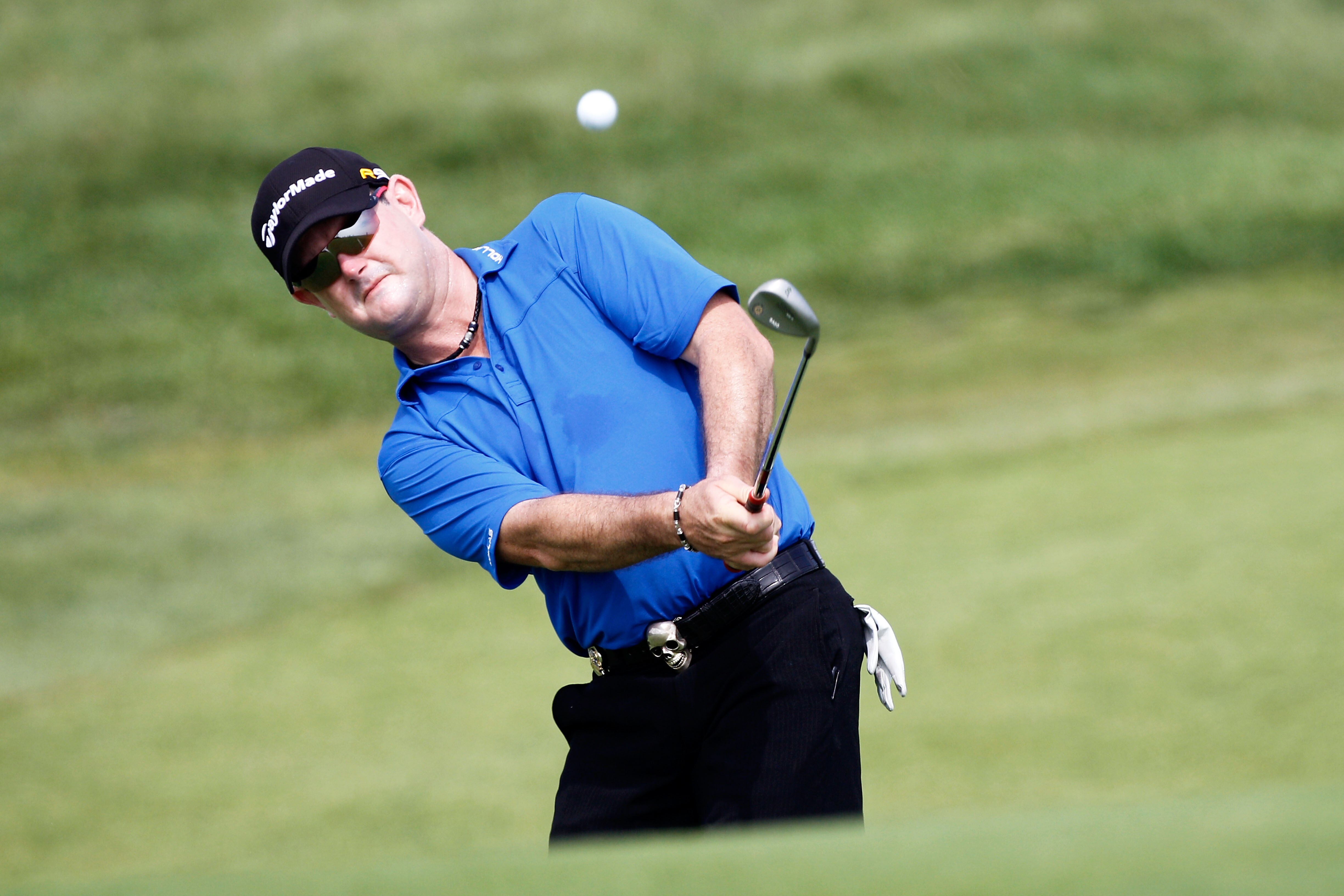 KOHLER, WI - AUGUST 10:  Rory Sabbatini of South Africa hits a shot during a practice round prior to the start of the 92nd PGA Championship on the Straits Course at Whistling Straits on August 10, 2010 in Kohler, Wisconsin.  (Photo by Sam Greenwood/Getty