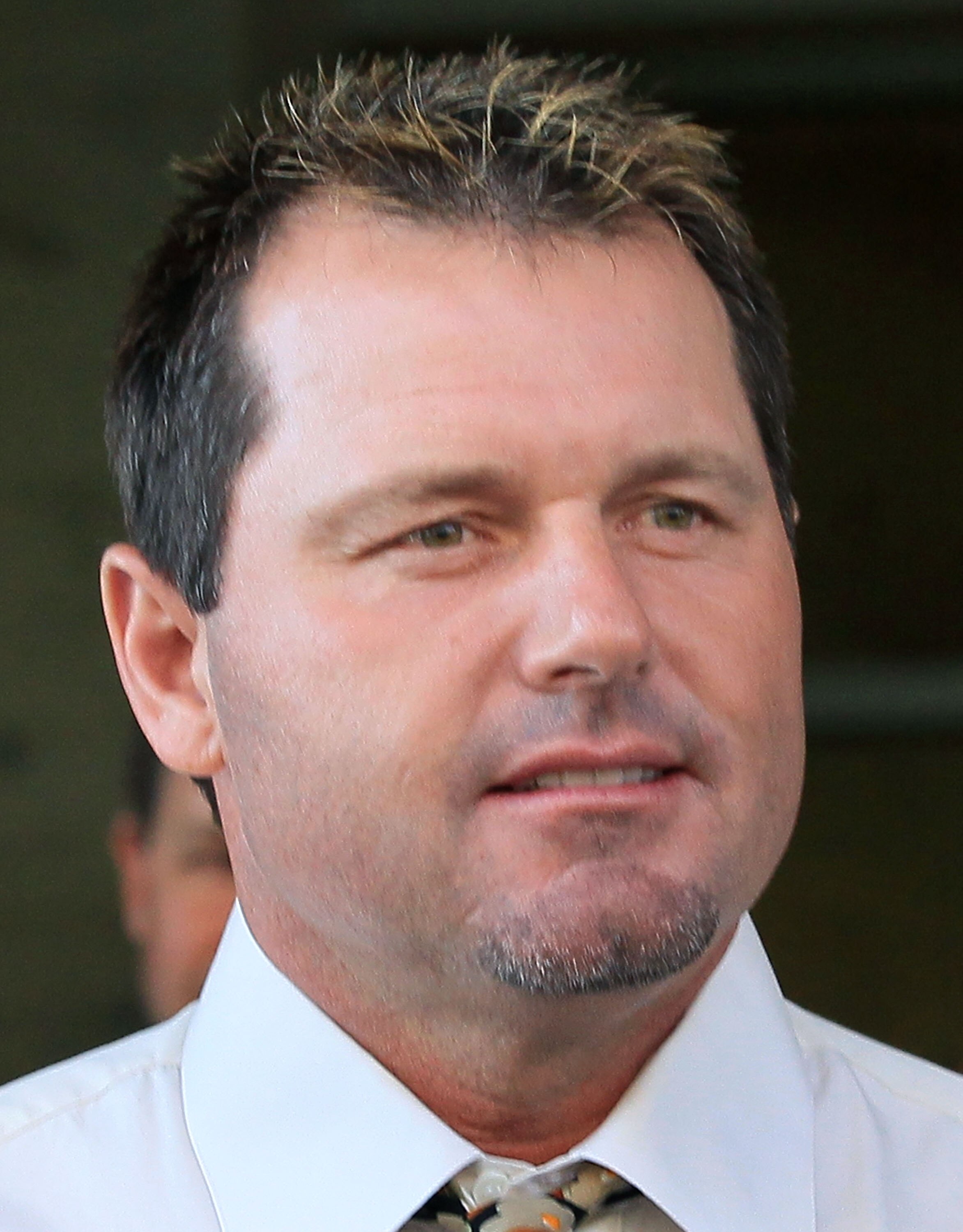 WASHINGTON - AUGUST 30:  Baseball pitching star Roger Clemens walks out of the U.S. District Court after his arraignment, on August 30, 2010 in Washington, DC. Clemens who plead not-guilty was charged with making false statements, perjury and obstructing