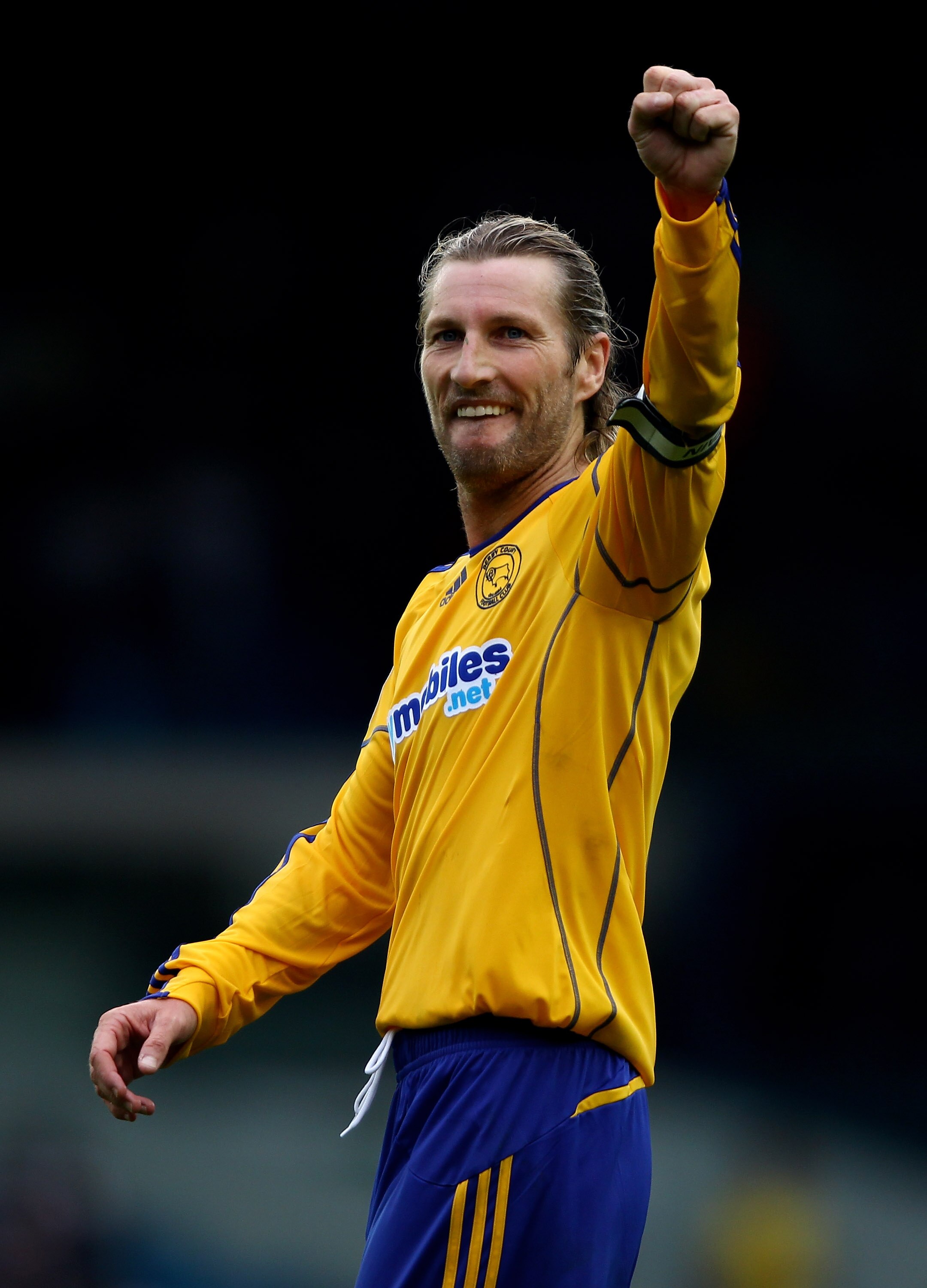 LEEDS, ENGLAND - AUGUST 07:  Robbie Savage of Derby County celebrates his teams victory after the npower Championship match between Leeds United and Derby County at Elland Road on August 7, 2010 in Leeds, England.  (Photo by Clive Brunskill/Getty Images)