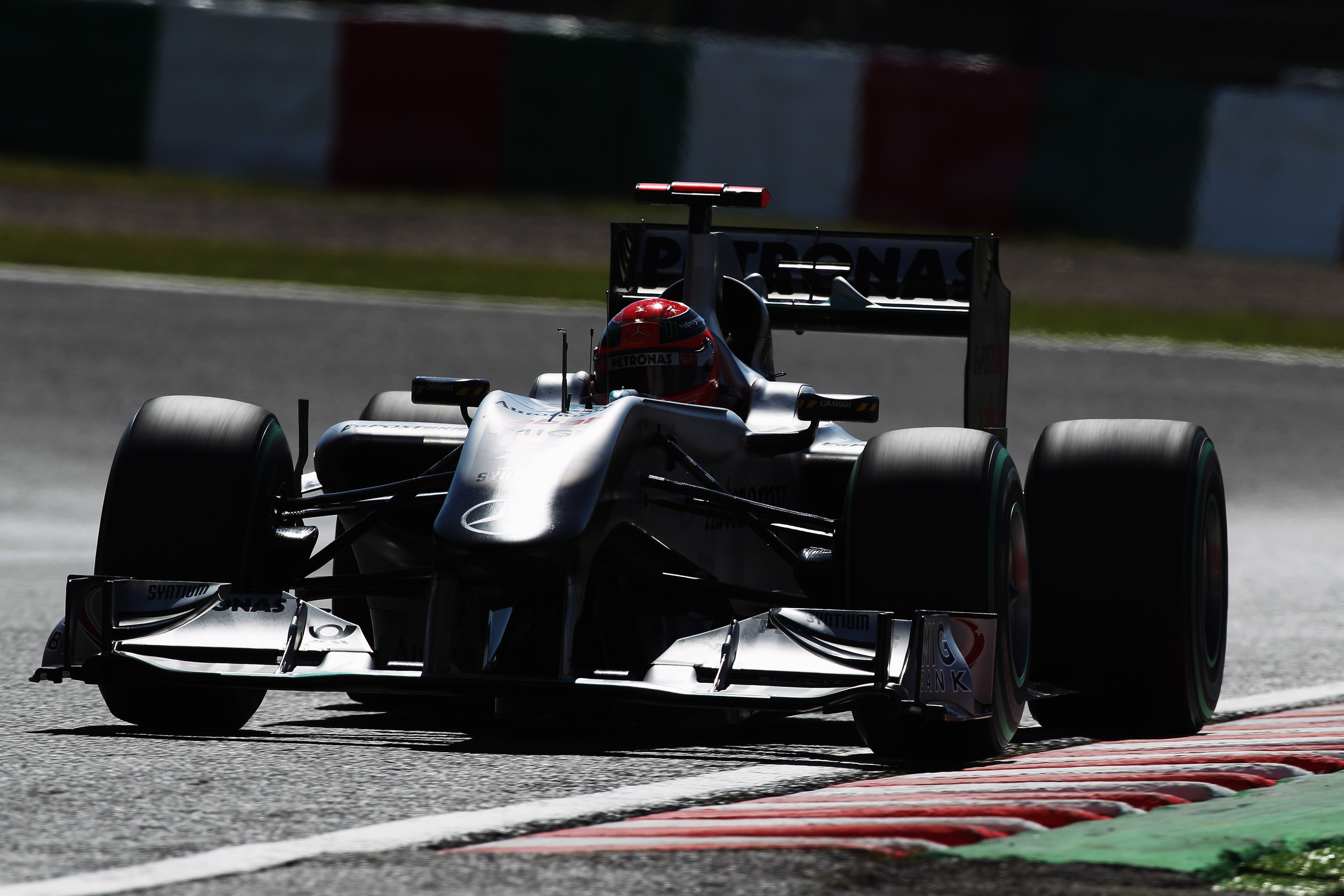 SUZUKA, JAPAN - OCTOBER 10:  Michael Schumacher of Germany and Mercedes GP drives during qualifying for the Japanese Formula One Grand Prix at Suzuka Circuit on October 10, 2010 in Suzuka, Japan.  (Photo by Mark Thompson/Getty Images)