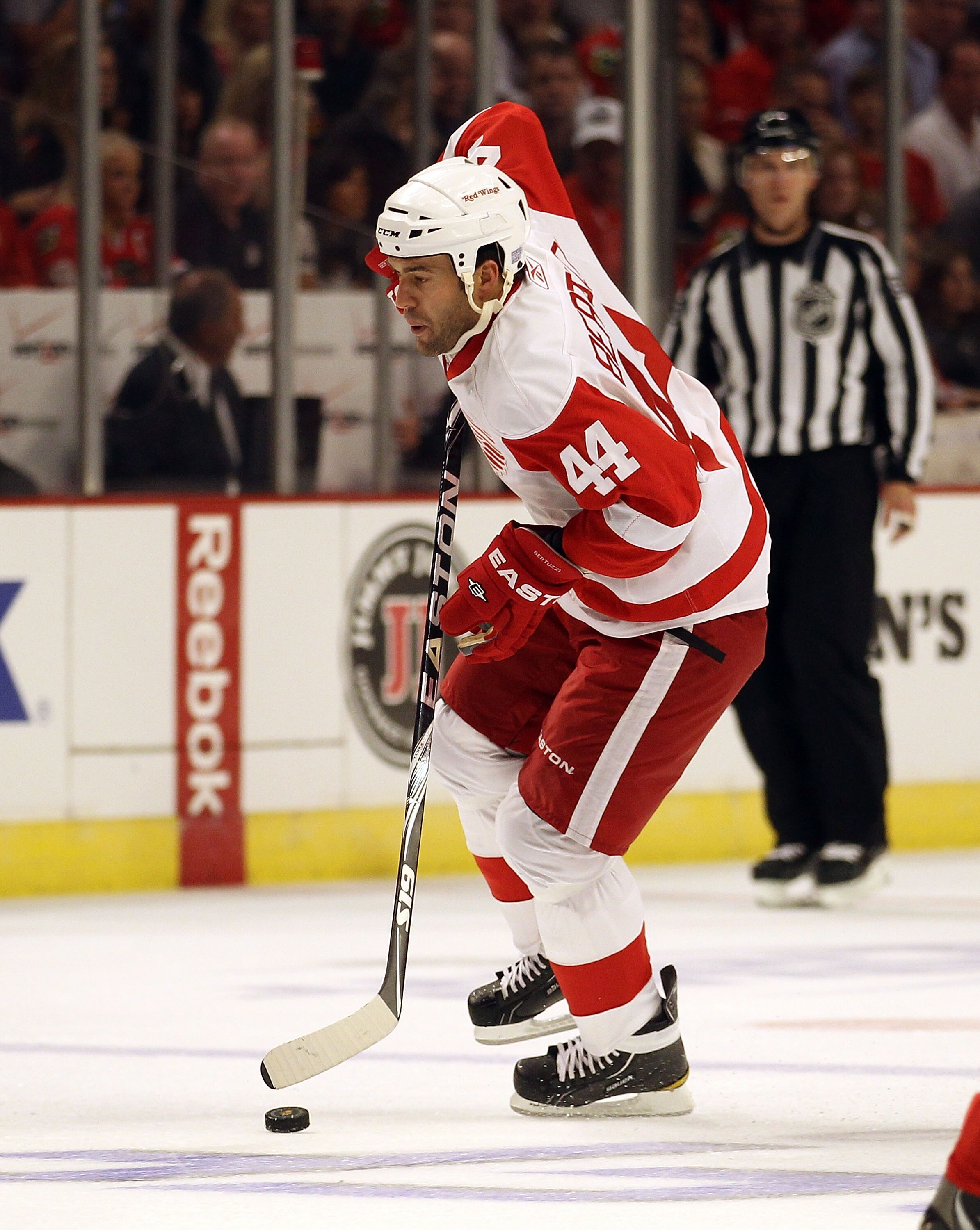CHICAGO - OCTOBER 09: Todd Bertuzzi #44 of the Detroit Red Wings controls the puck against the Chicago Blackhawks during the Blackhawks season home opening game at the United Center on October 9, 2010 in Chicago, Illinois. The Red Wings defeated the Black