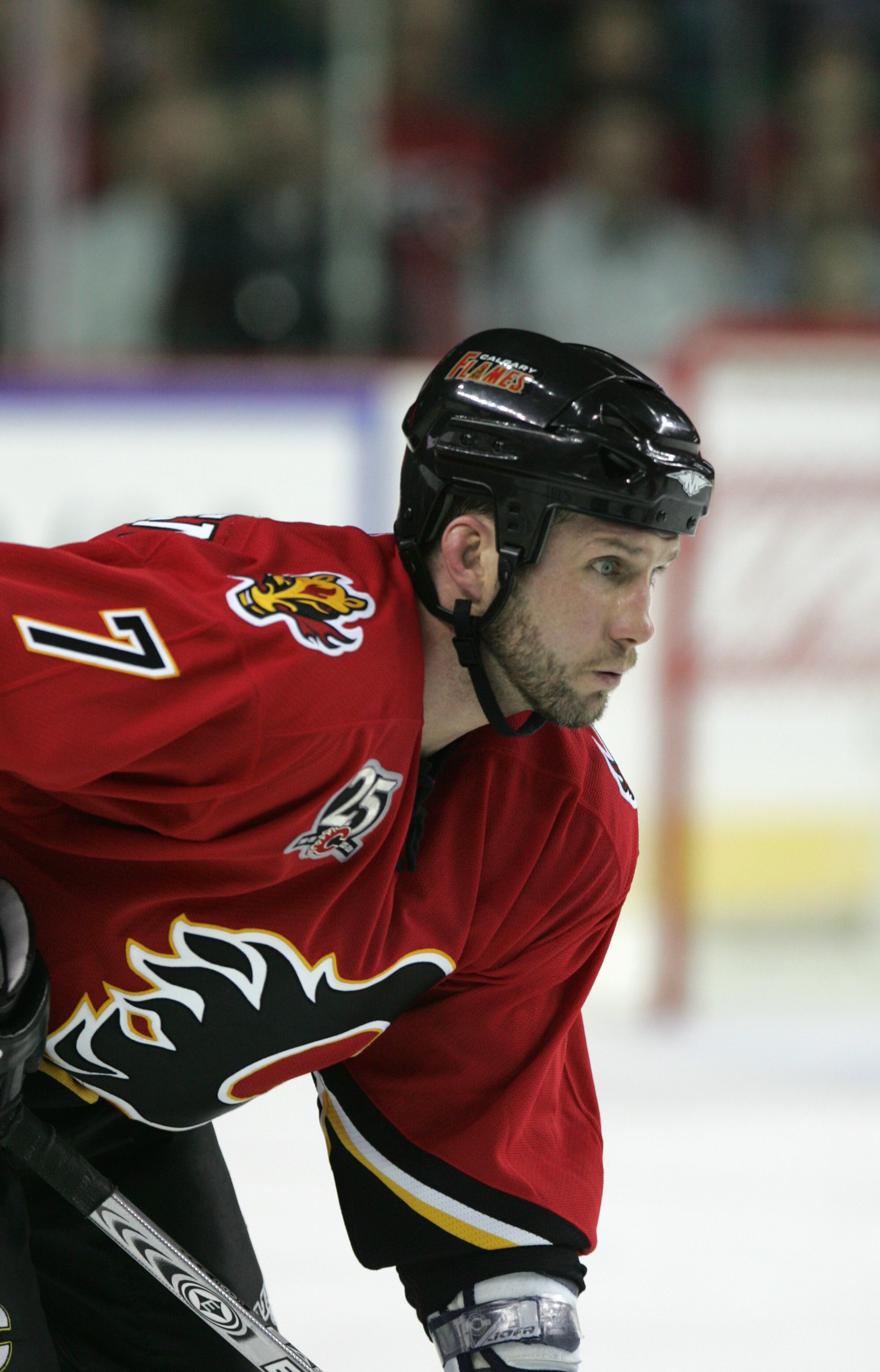 CALGARY, CANADA - MARCH 29: Bryan Marchment #7 of the Calgary Flames gets ready on the ice during the game against the Los Angeles Kings on March 29, 2006 at the Pengrowth Saddledome in Calgary, Alberta, Canada. (Photo By Bruce Bennett/Getty Images)