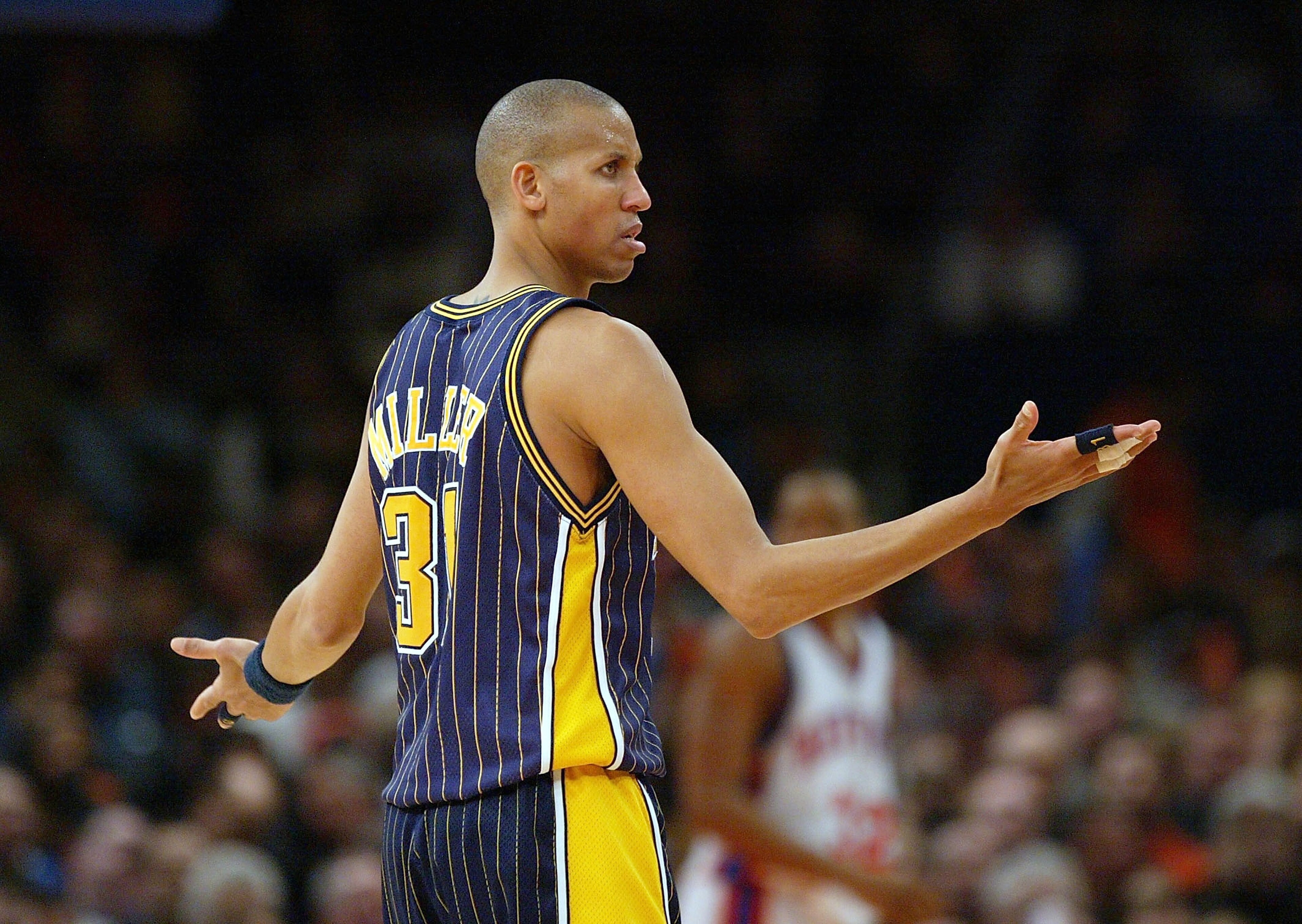 NEW YORK - FEBRUARY 3: Reggie Miller #31 of the Indiana Pacers questions a call during their game against the New York Knicks on February 3, 2004 at Madison Square Garden in New York City. The Knicks won 97-90. NOTE TO USER: User expressly acknowledges NEW YORK - FEBRUARY 3: Reggie Miller #31 of the Indiana Pacers questions a call during their game against the New York Knicks on February 3, 2004 at Madison Square Garden in New York City. The Knicks won 97-90. NOTE TO USER: User expressly acknowledges