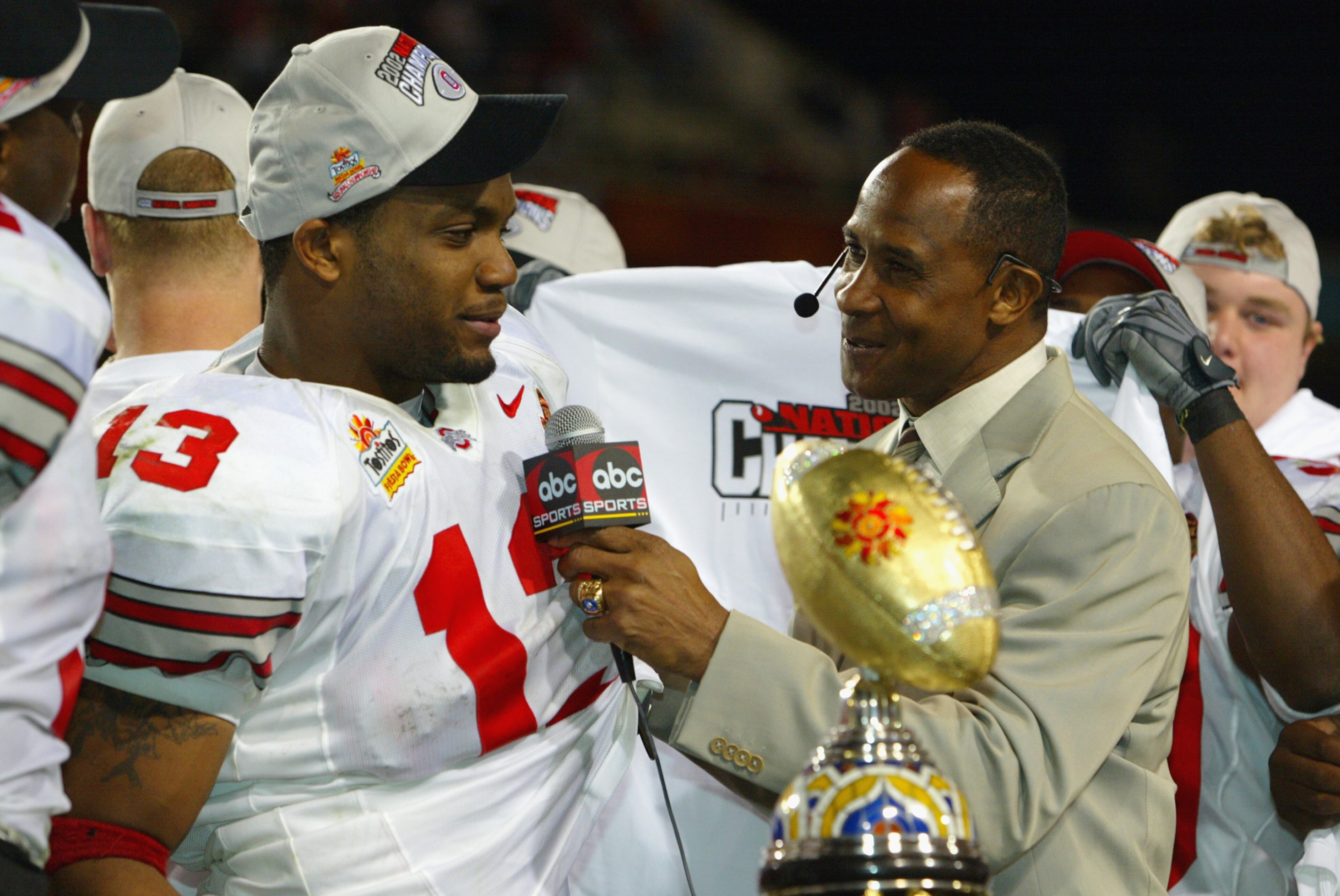 TEMPE, AZ - JANUARY 3: Running back Maurice Clarett #13 of the Ohio State Buckeyes is interviewed by Lynn Swann after deafeating the Miami Hurricanes in the Tostitos Fiesta Bowl on January 3, 2003 at Sun Devil Stadium in Tempe, Arizona. Ohio State won t TEMPE, AZ - JANUARY 3: Running back Maurice Clarett #13 of the Ohio State Buckeyes is interviewed by Lynn Swann after deafeating the Miami Hurricanes in the Tostitos Fiesta Bowl on January 3, 2003 at Sun Devil Stadium in Tempe, Arizona. Ohio State won t