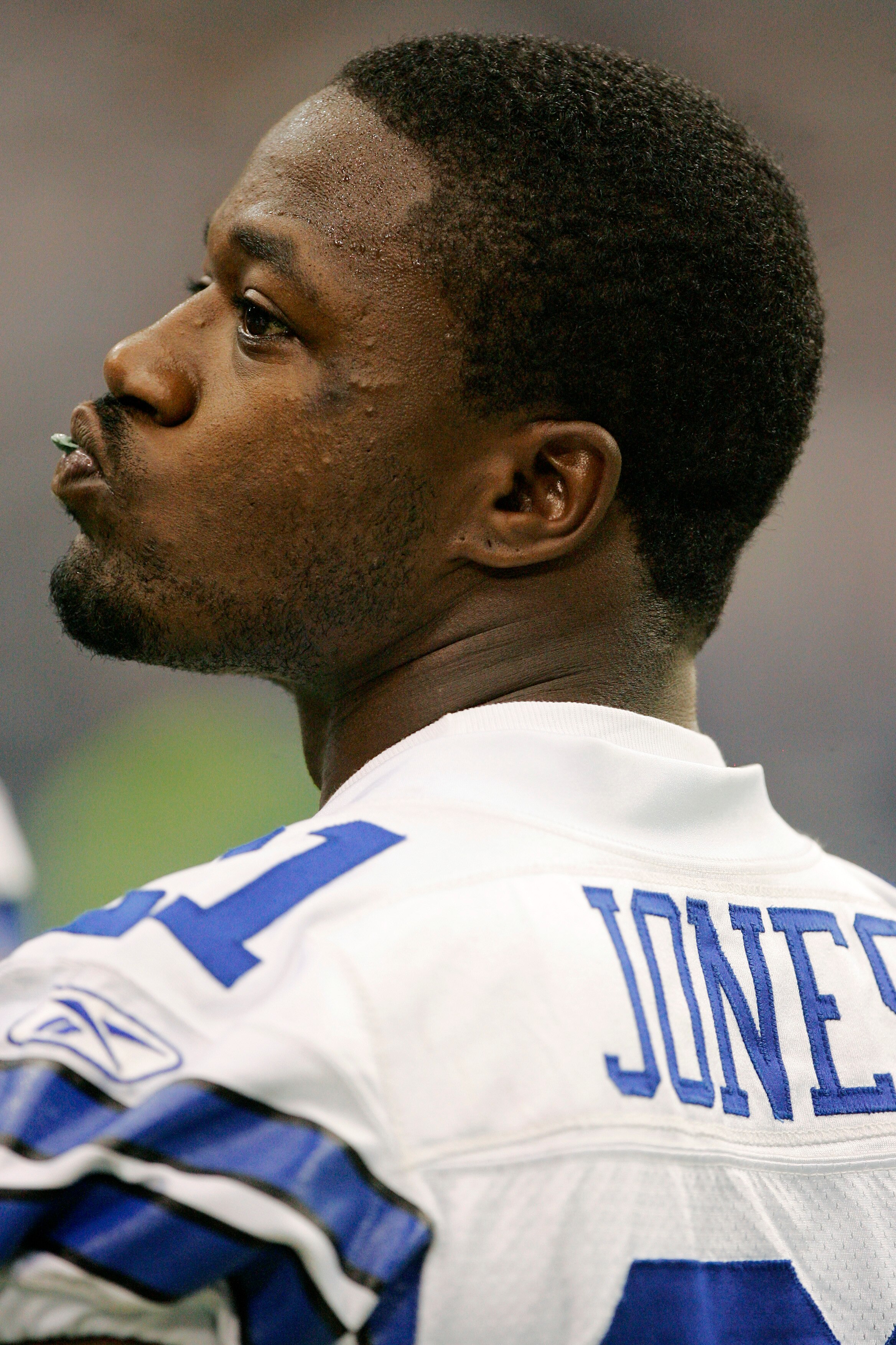 IRVING - AUGUST 28:  Cornerback Adam 'Pacman' Jones #21 of the Dallas Cowboys watches from the sidelines during a preseason game against the Minnesota Vikings after being reinstated to the league earlier in the day on August 28, 2008 at Texas Stadium in I