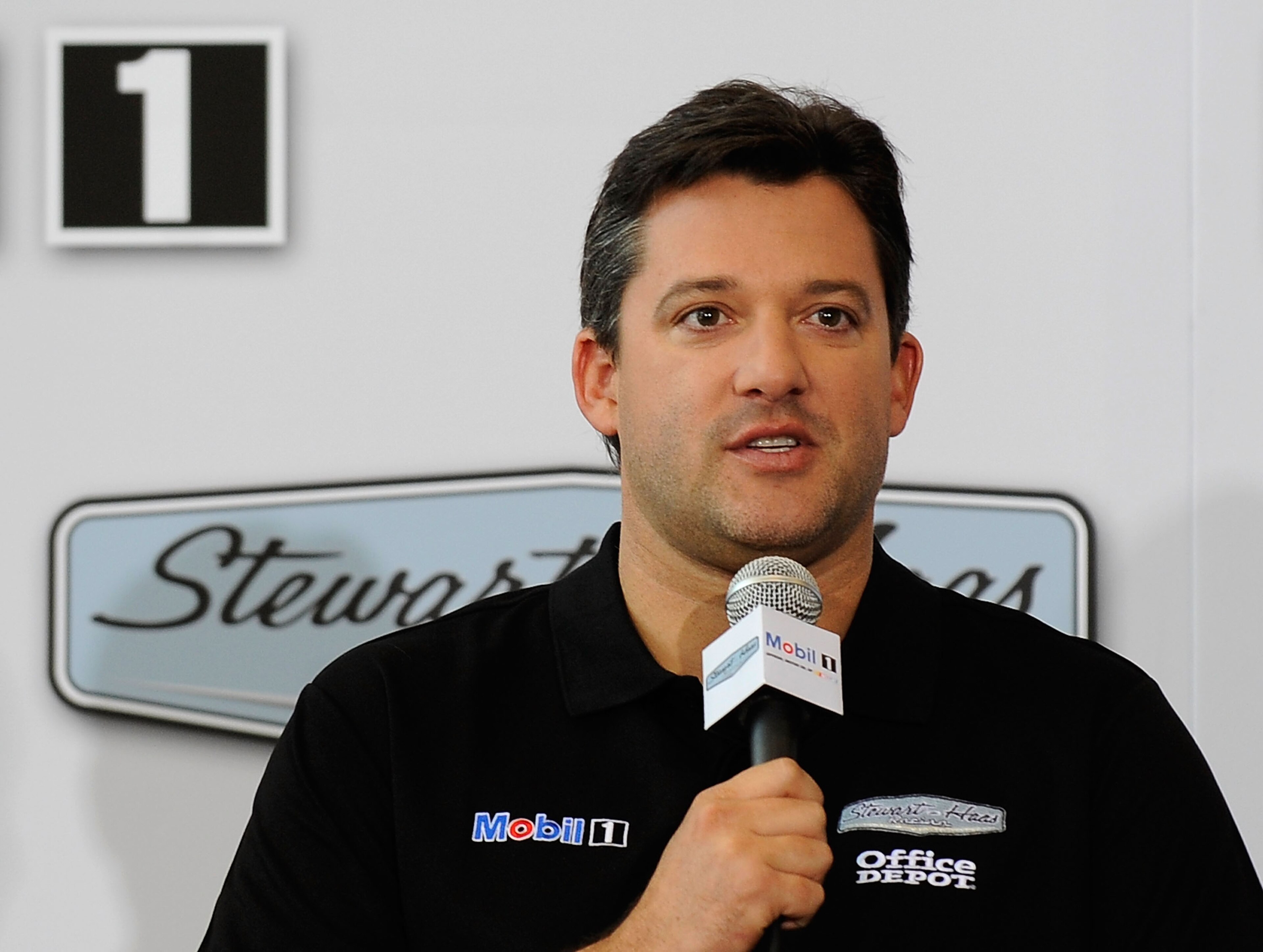 KANNAPOLIS, NC - OCTOBER 12: Tony Stewart, Stewart-Haas Racing's driver/owner, announced Mobil 1 as his co-primary sponsor with Office Depot beginning in 2011 at Stewart-Haas Racing on October 12, 2010 in Kannapolis, North Carolina. (Photo by Rusty Jarr KANNAPOLIS, NC - OCTOBER 12: Tony Stewart, Stewart-Haas Racing's driver/owner, announced Mobil 1 as his co-primary sponsor with Office Depot beginning in 2011 at Stewart-Haas Racing on October 12, 2010 in Kannapolis, North Carolina. (Photo by Rusty Jarr